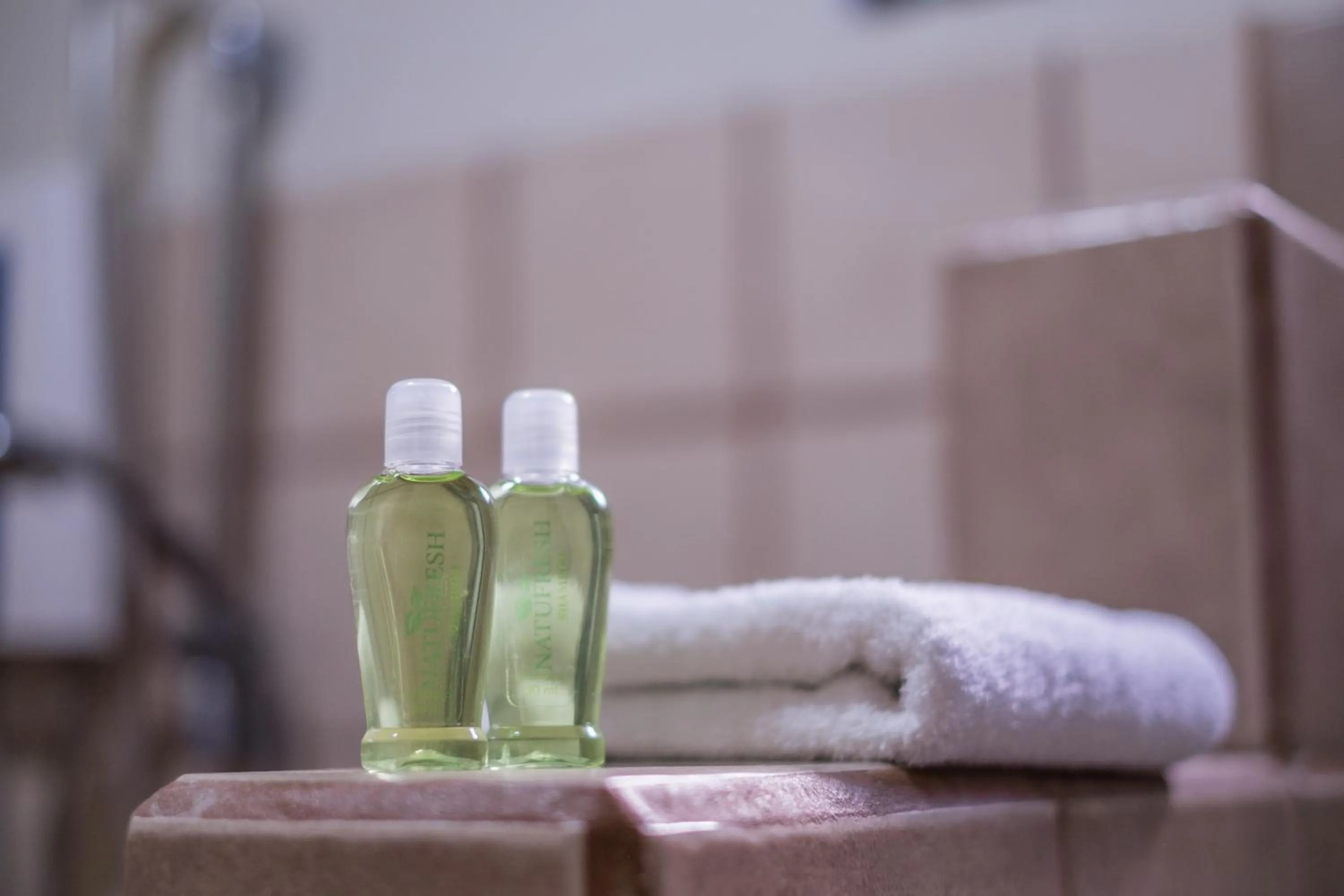 Shower in Zula Inn Aparthotel