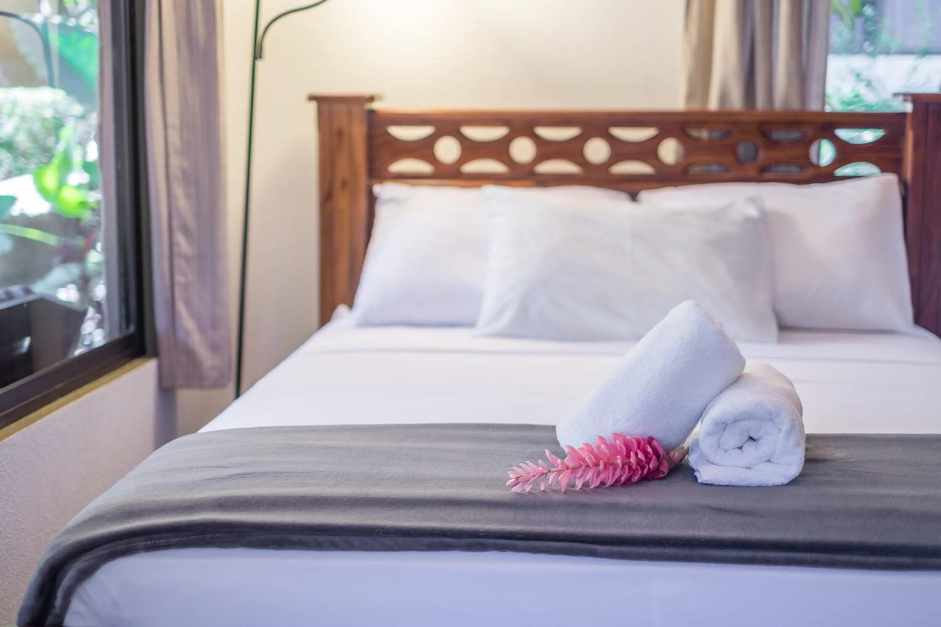 Bed in Zula Inn Aparthotel