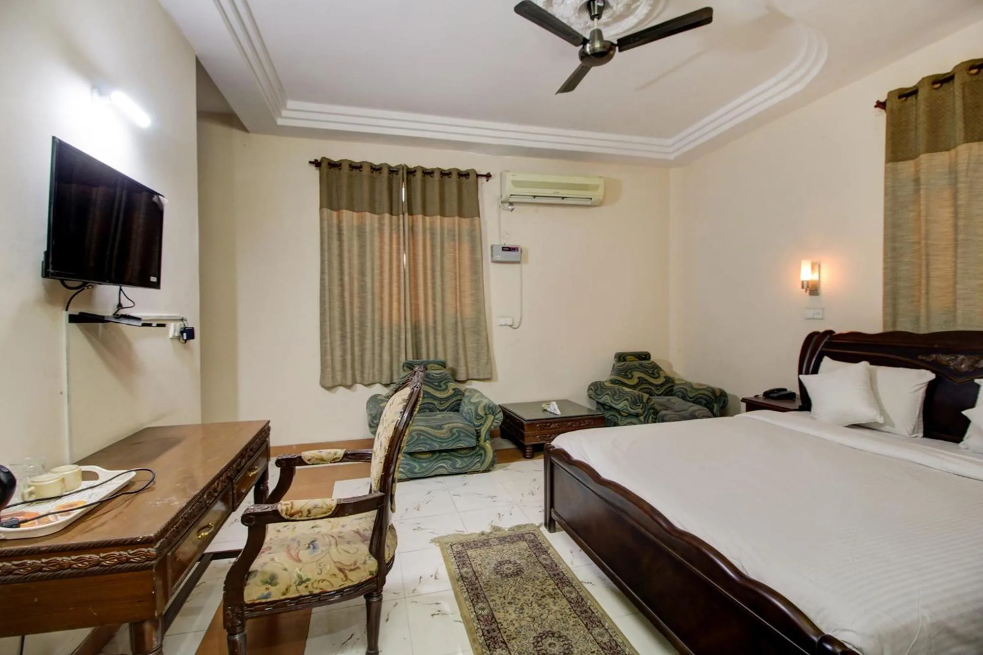 Bedroom, Bed in Hotel Pinjore Holiday Home
