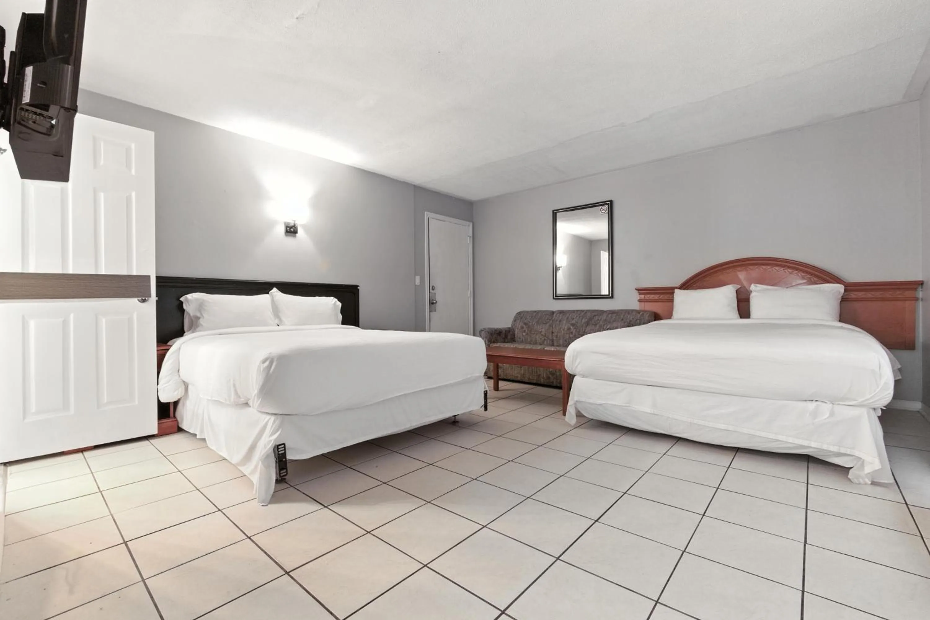 Bed in iCheck Inn Motel