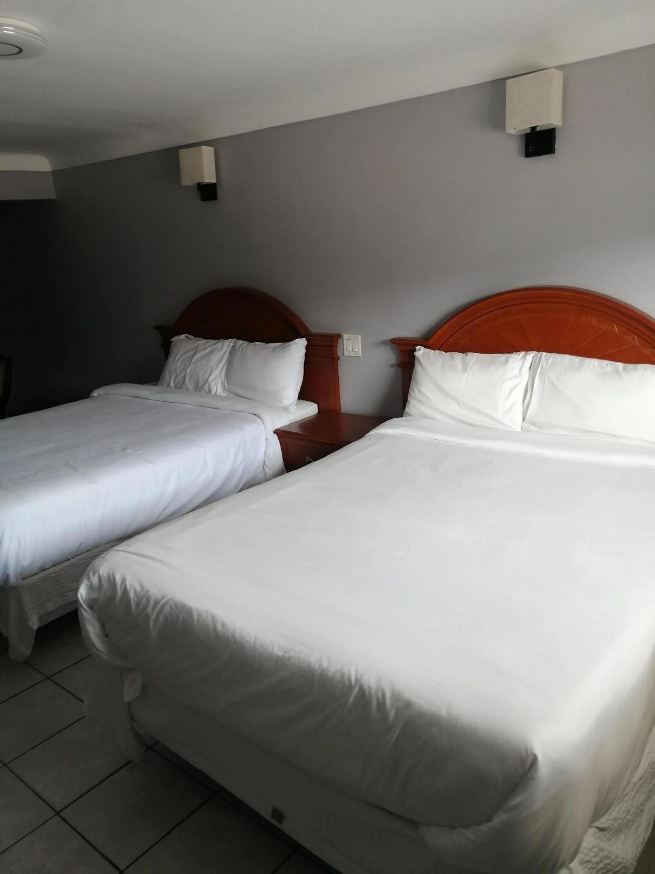 Bed in iCheck Inn Motel