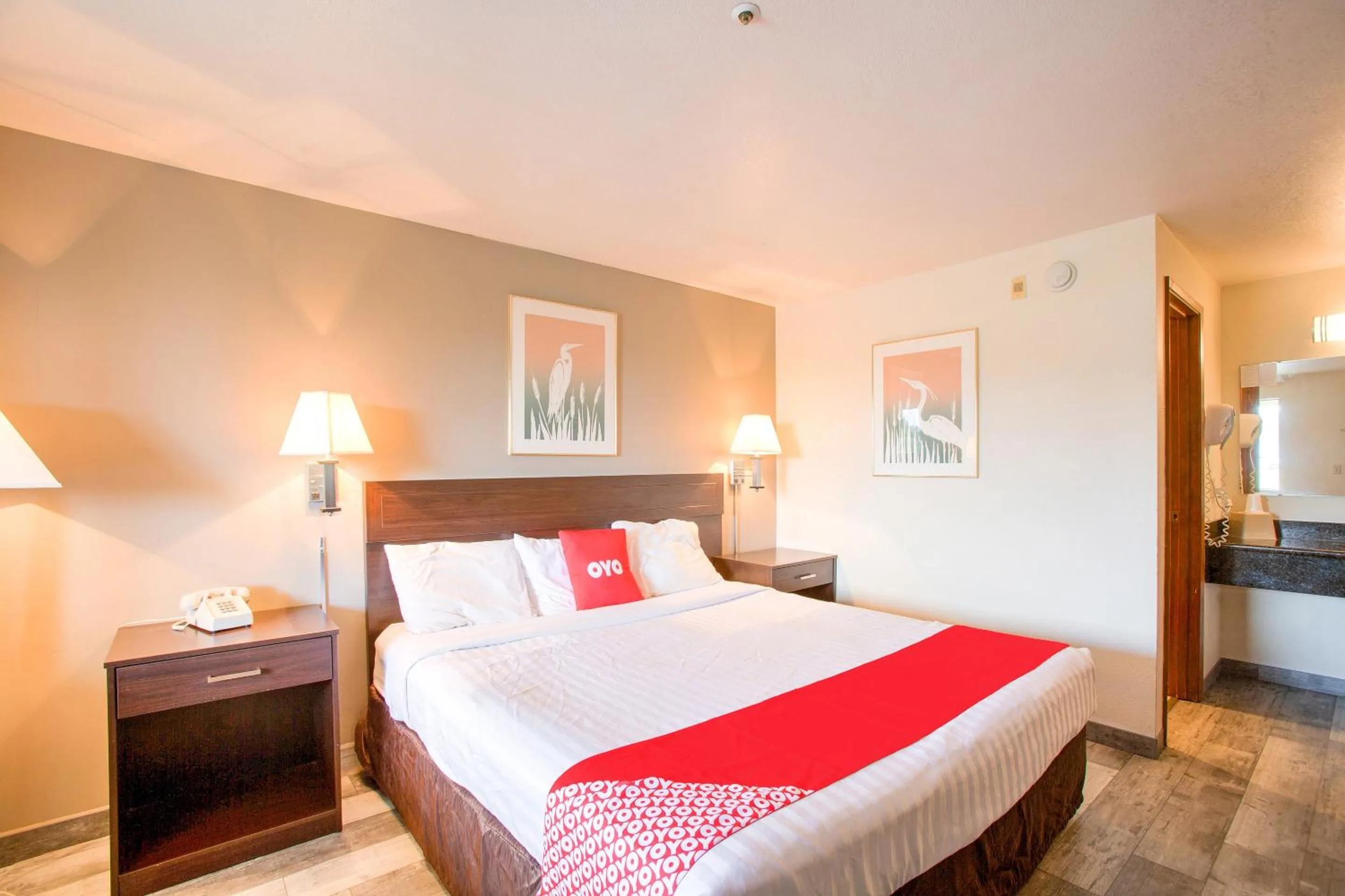 Bedroom, Bed in OYO Woodland Hotel and Suites