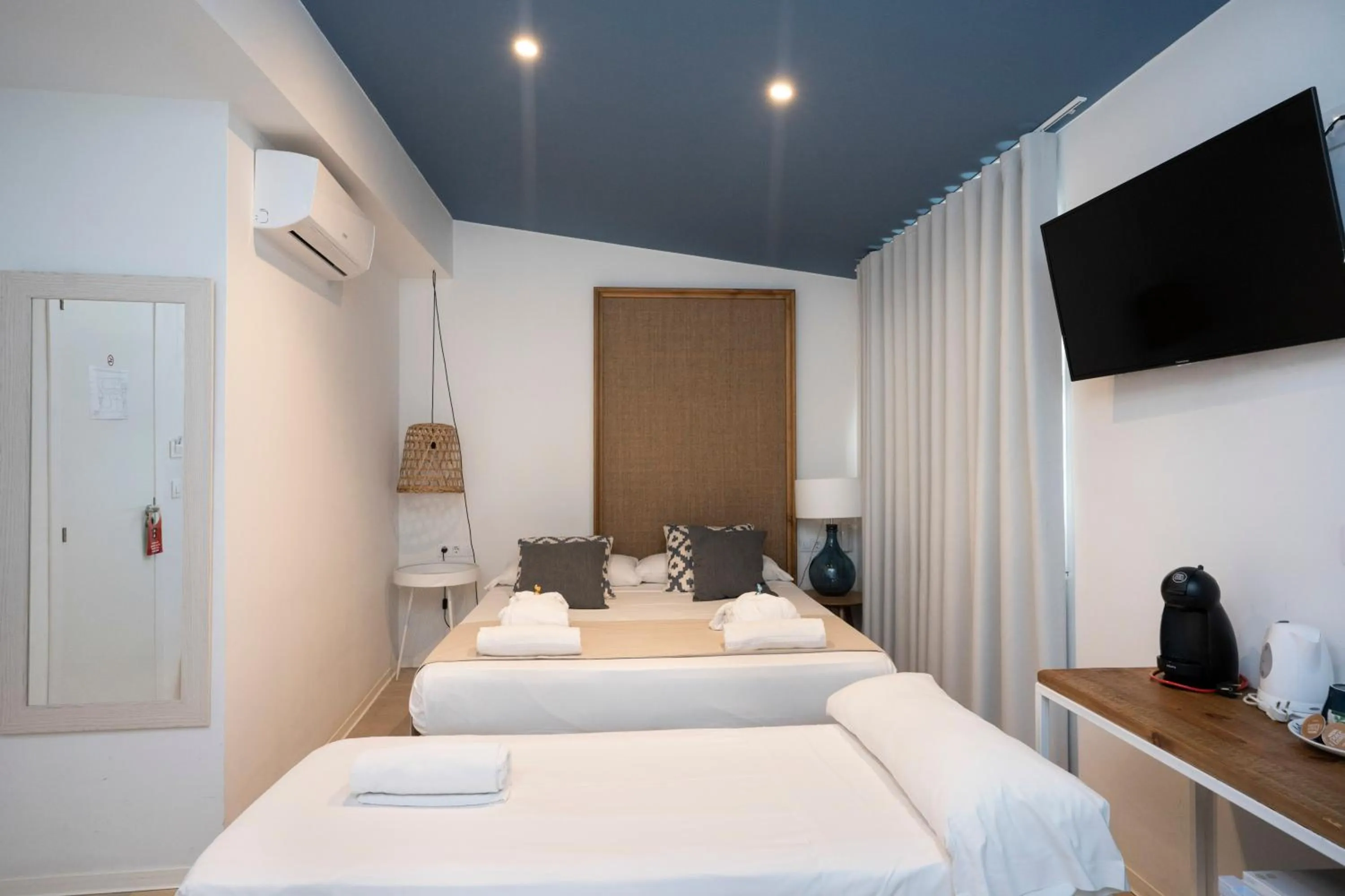 Bed in YOU & CO. Saler Beach Boutique