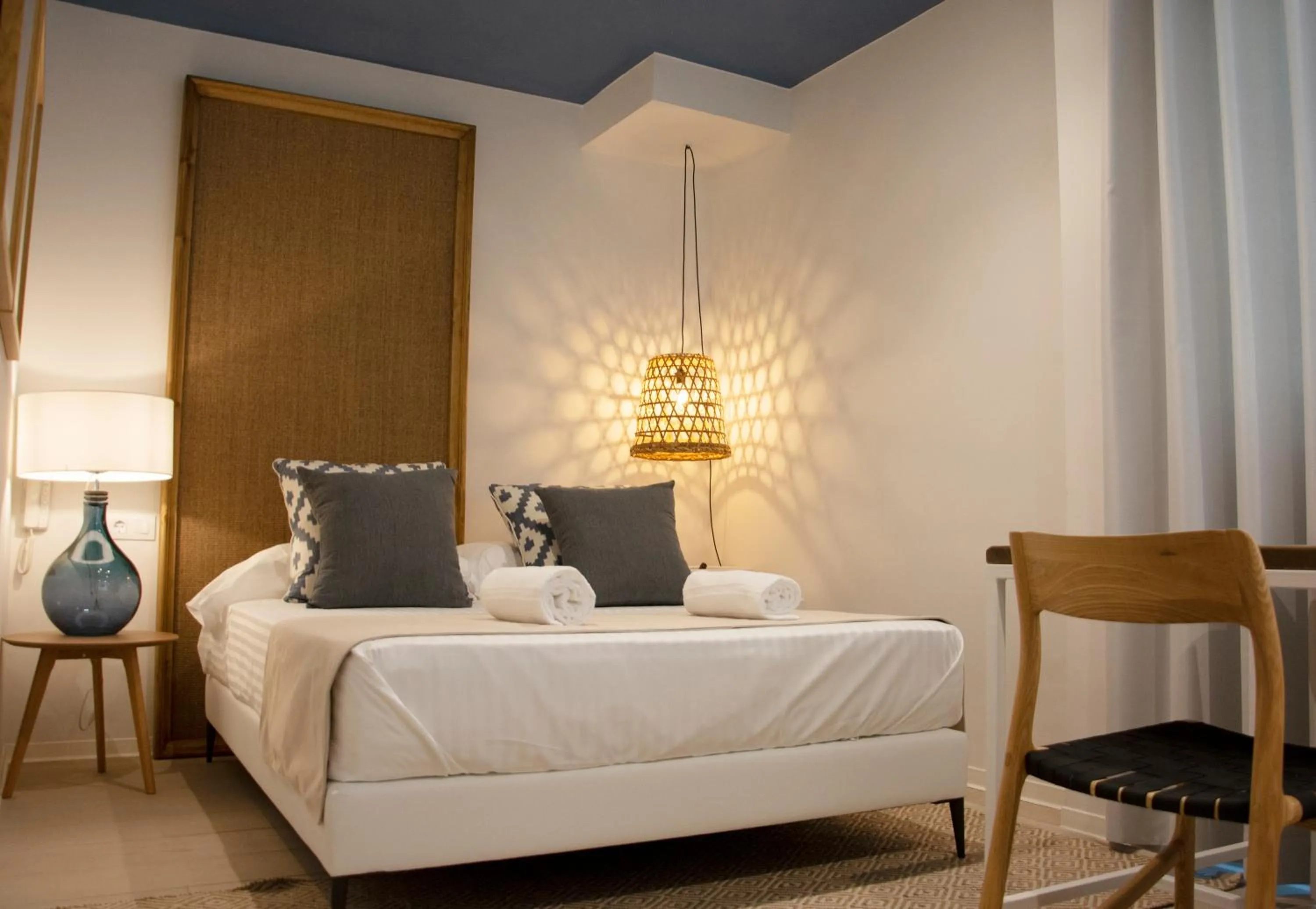 Photo of the whole room, Bed in YOU & CO. Saler Beach Boutique