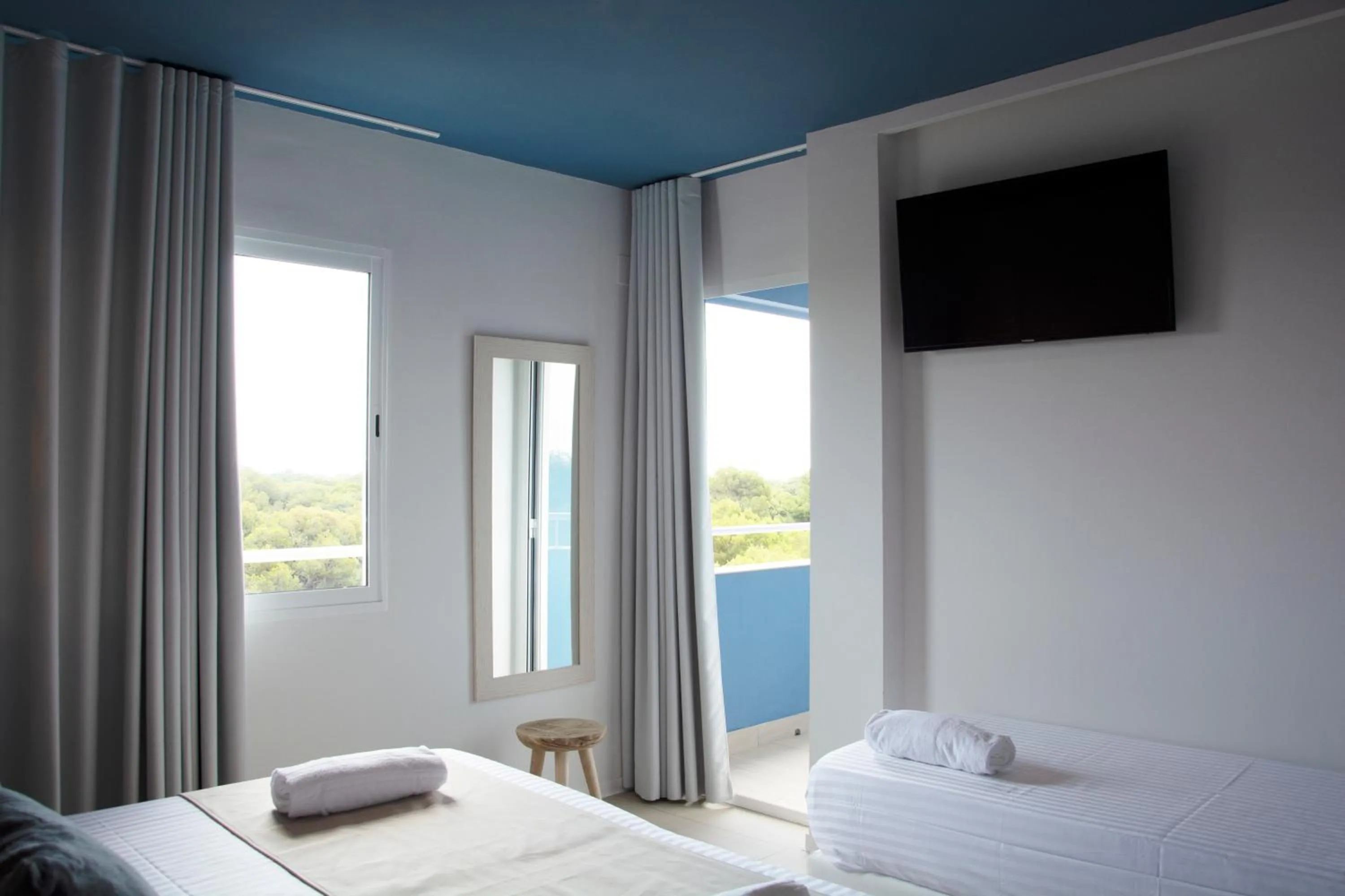 Photo of the whole room, Bed in YOU & CO. Saler Beach Boutique