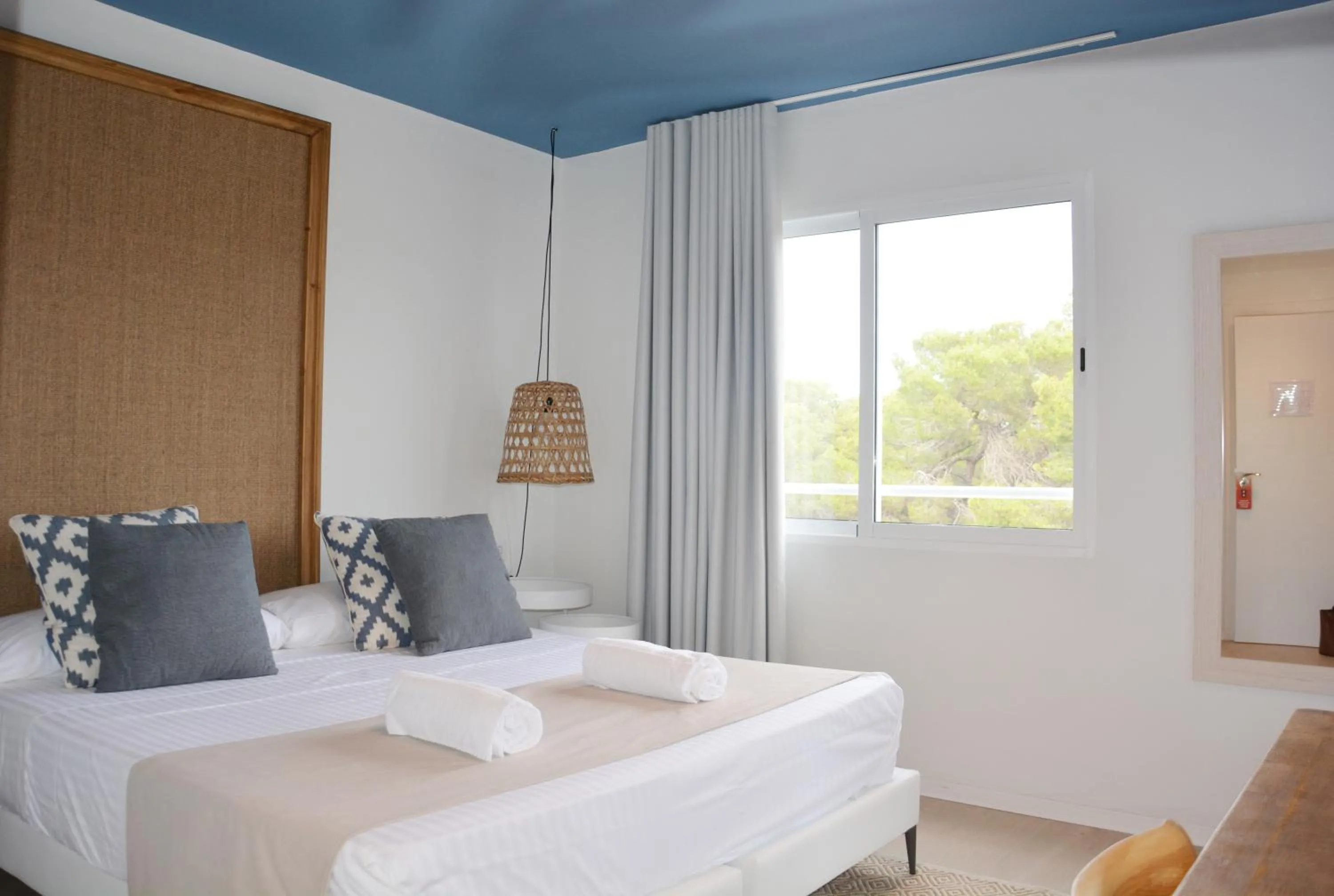 Photo of the whole room, Bed in YOU & CO. Saler Beach Boutique