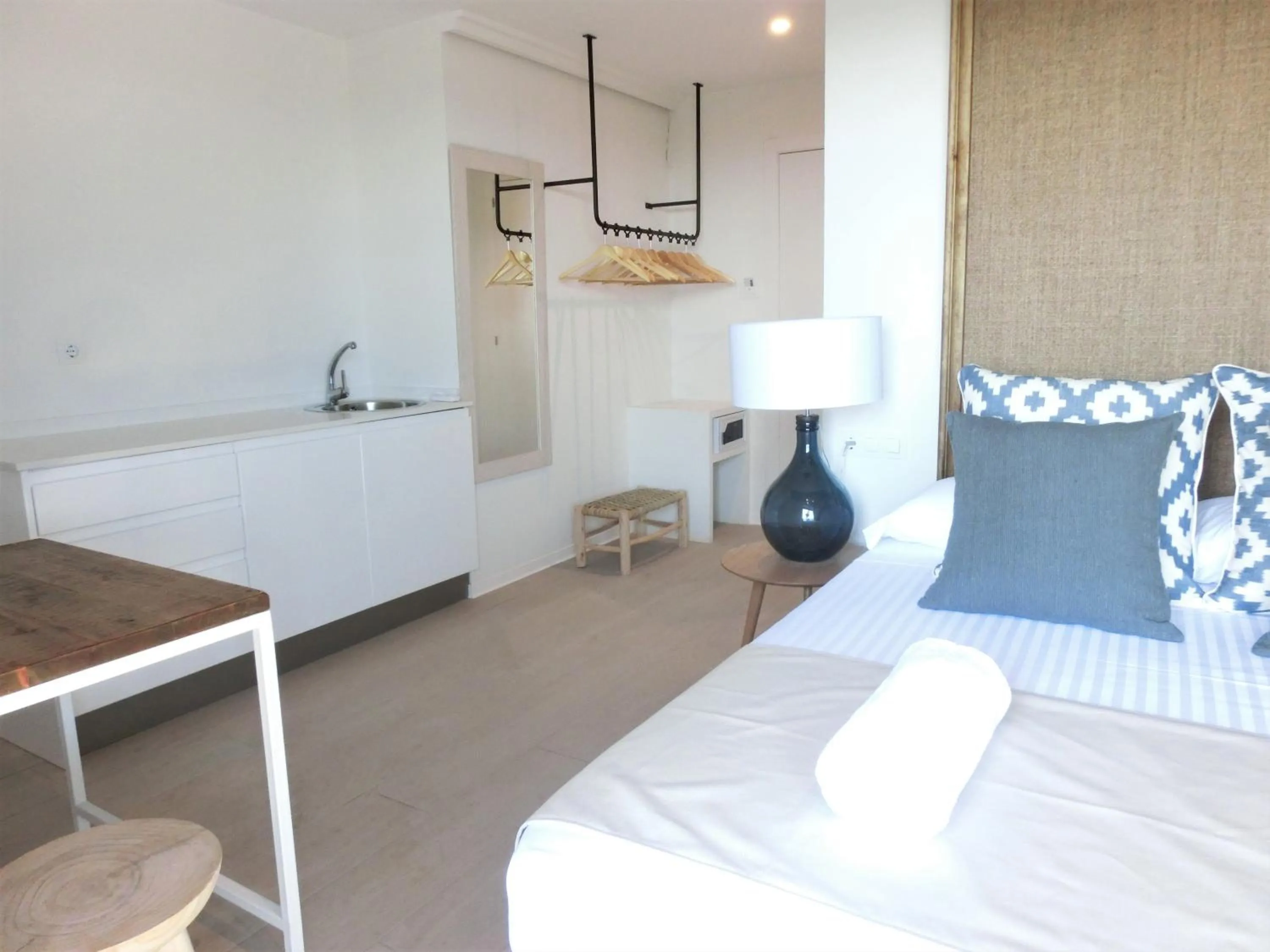 Photo of the whole room, Bed in YOU & CO. Saler Beach Boutique