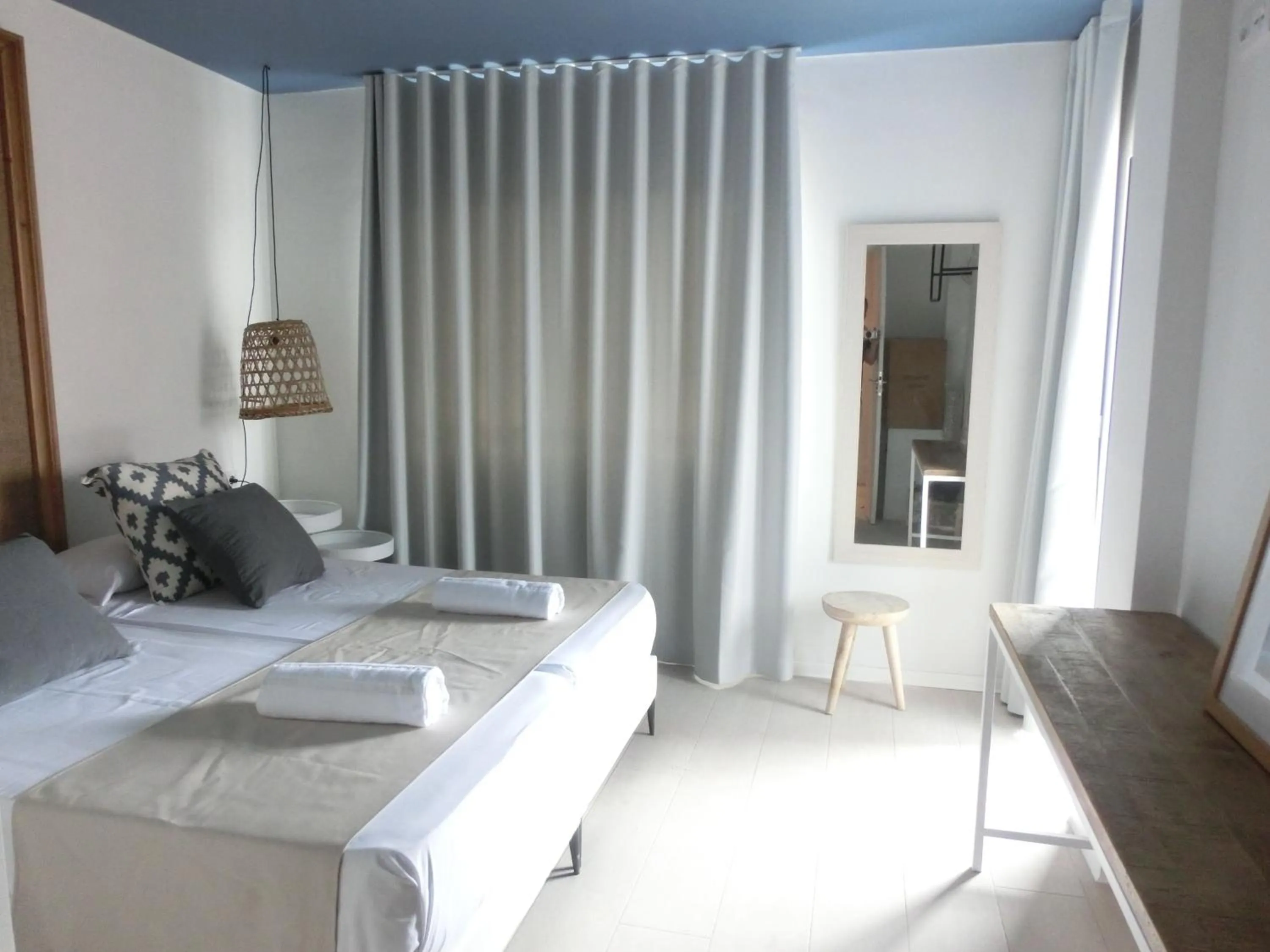 Photo of the whole room, Bed in YOU & CO. Saler Beach Boutique