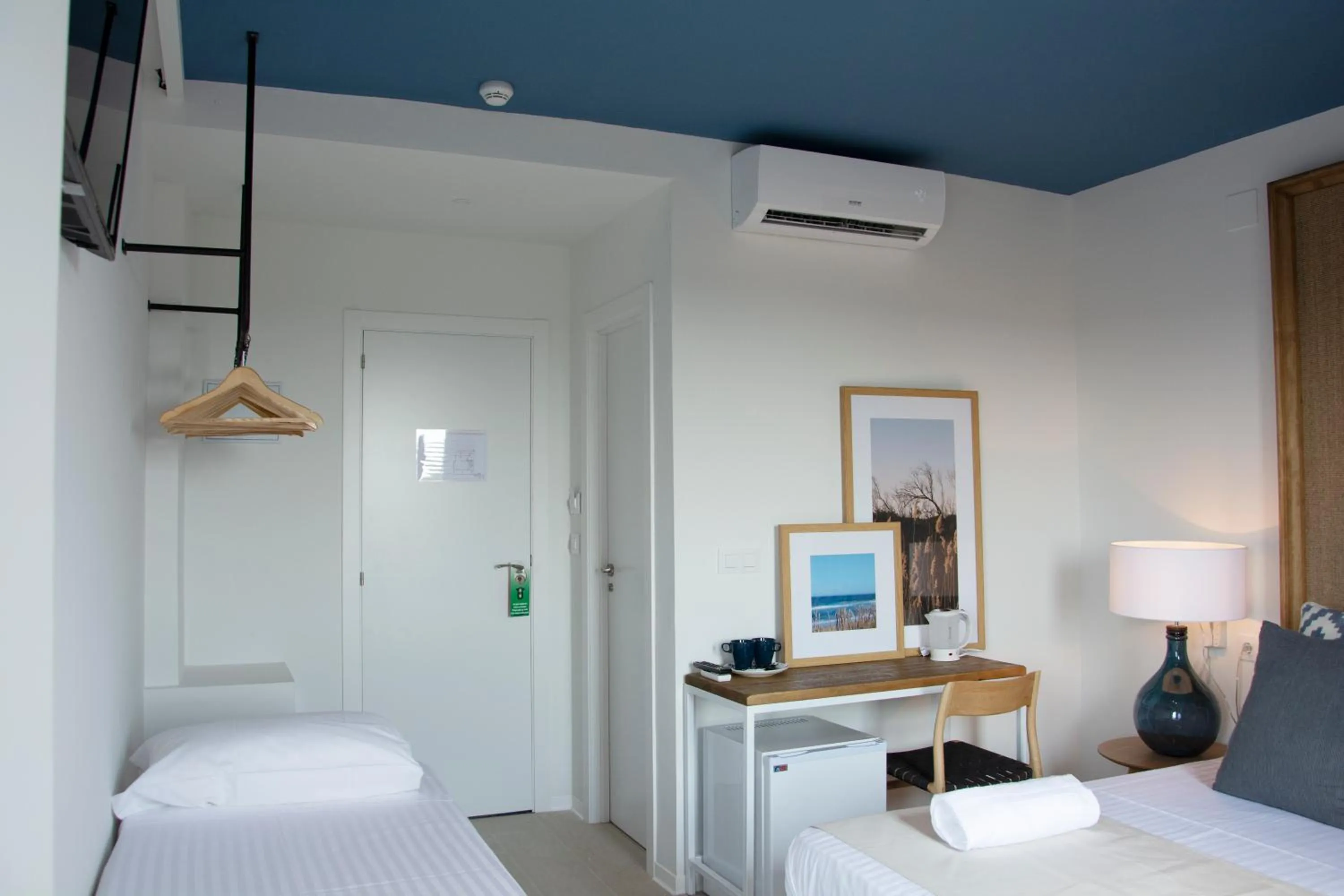 Photo of the whole room, Bed in YOU & CO. Saler Beach Boutique