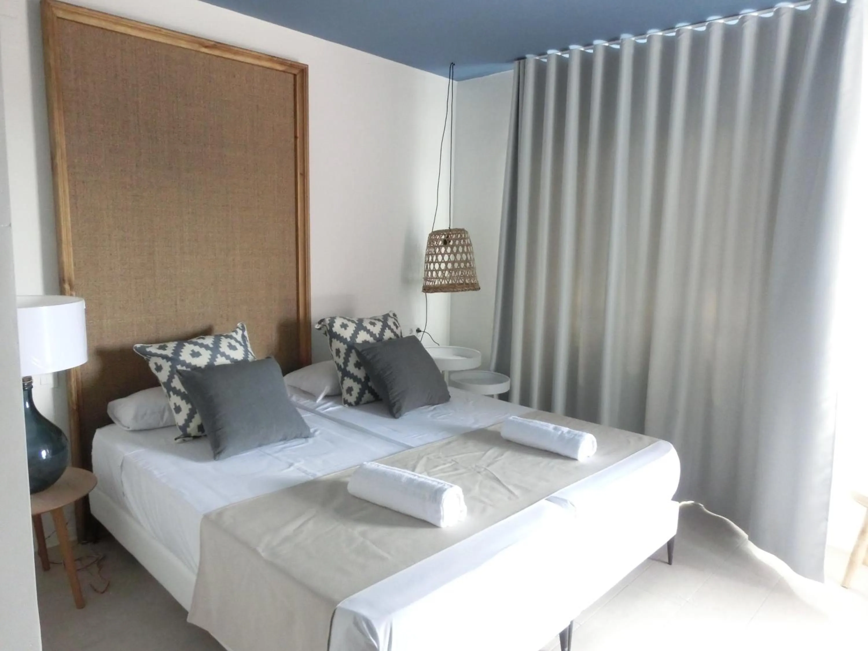 Photo of the whole room, Bed in YOU & CO. Saler Beach Boutique