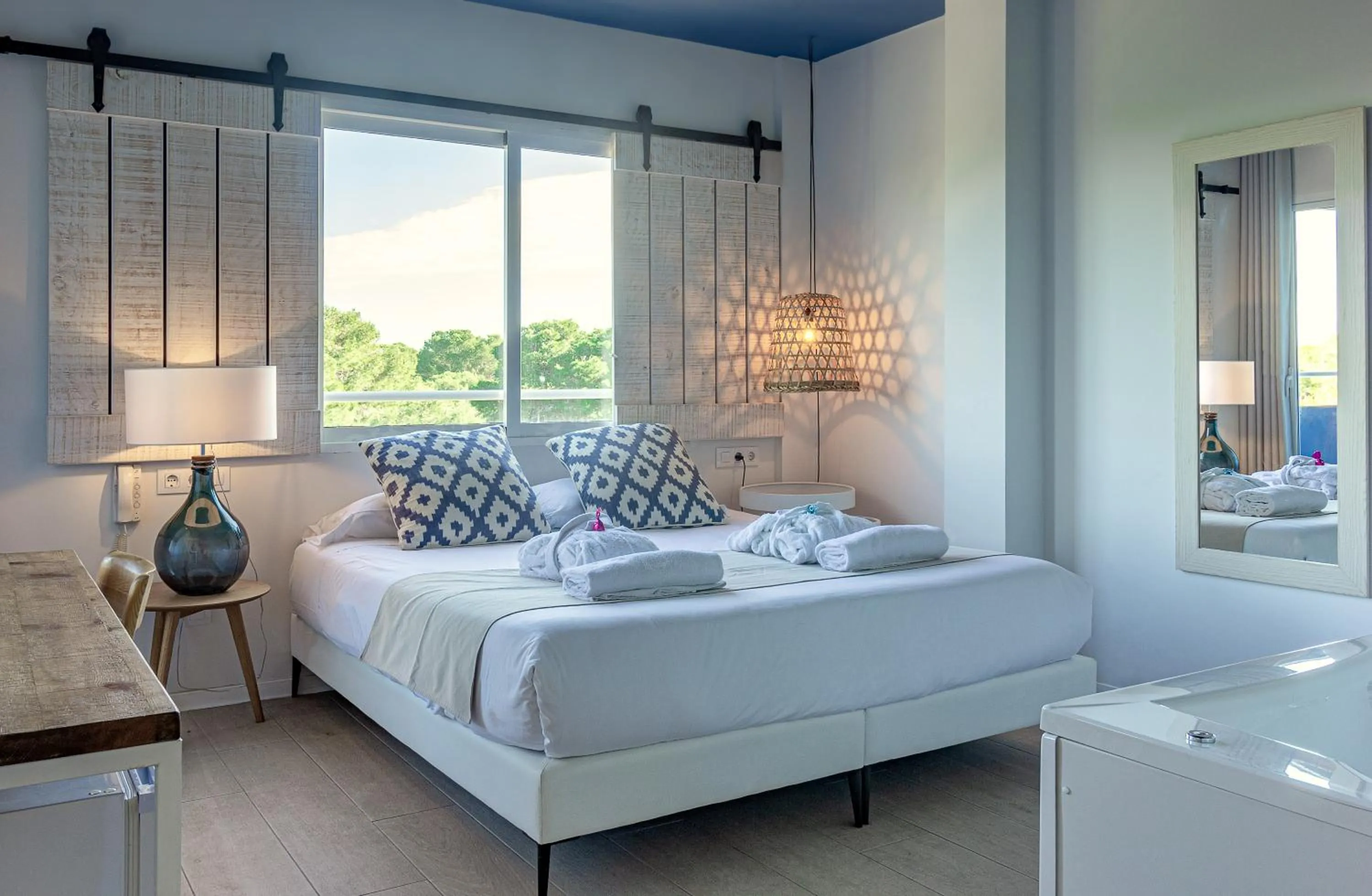 Photo of the whole room, Bed in YOU & CO. Saler Beach Boutique