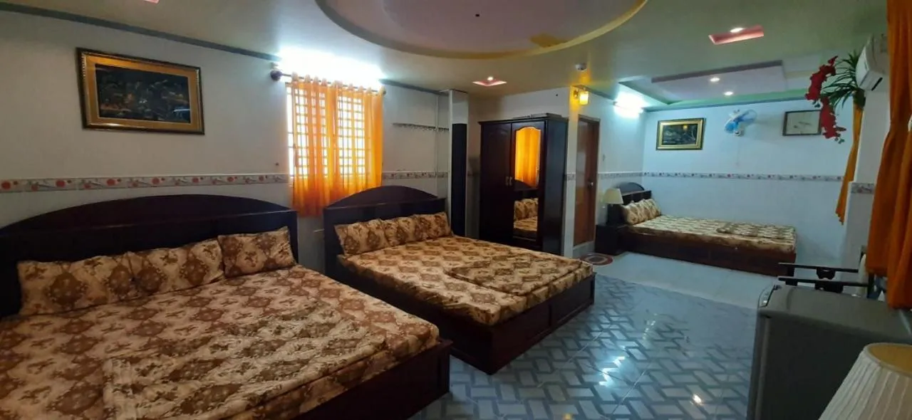 Bed in Huynh Lac Can Tho Hotel