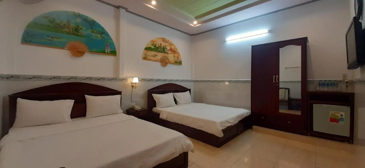 Bed in Huynh Lac Can Tho Hotel