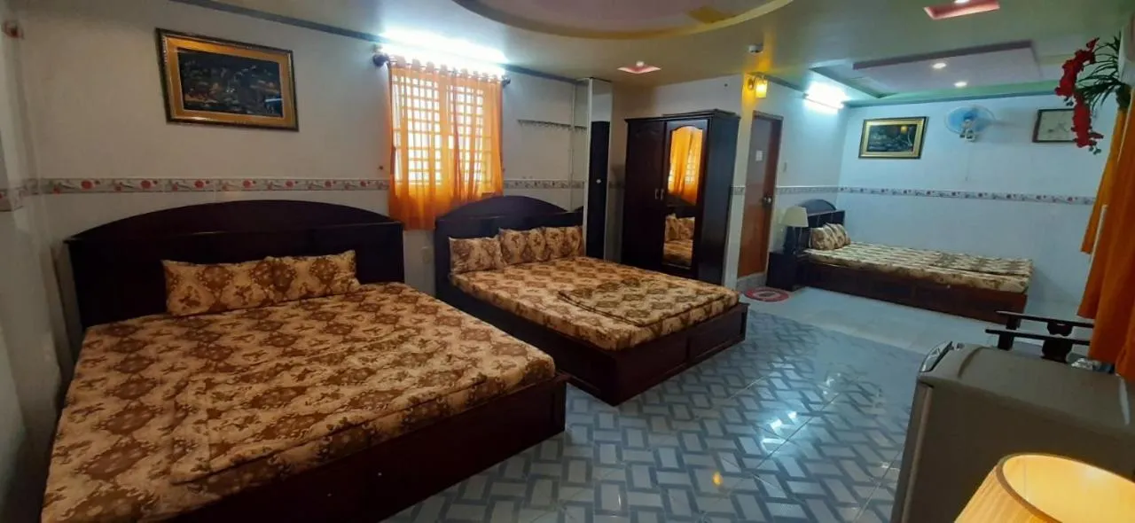 Bed in Huynh Lac Can Tho Hotel