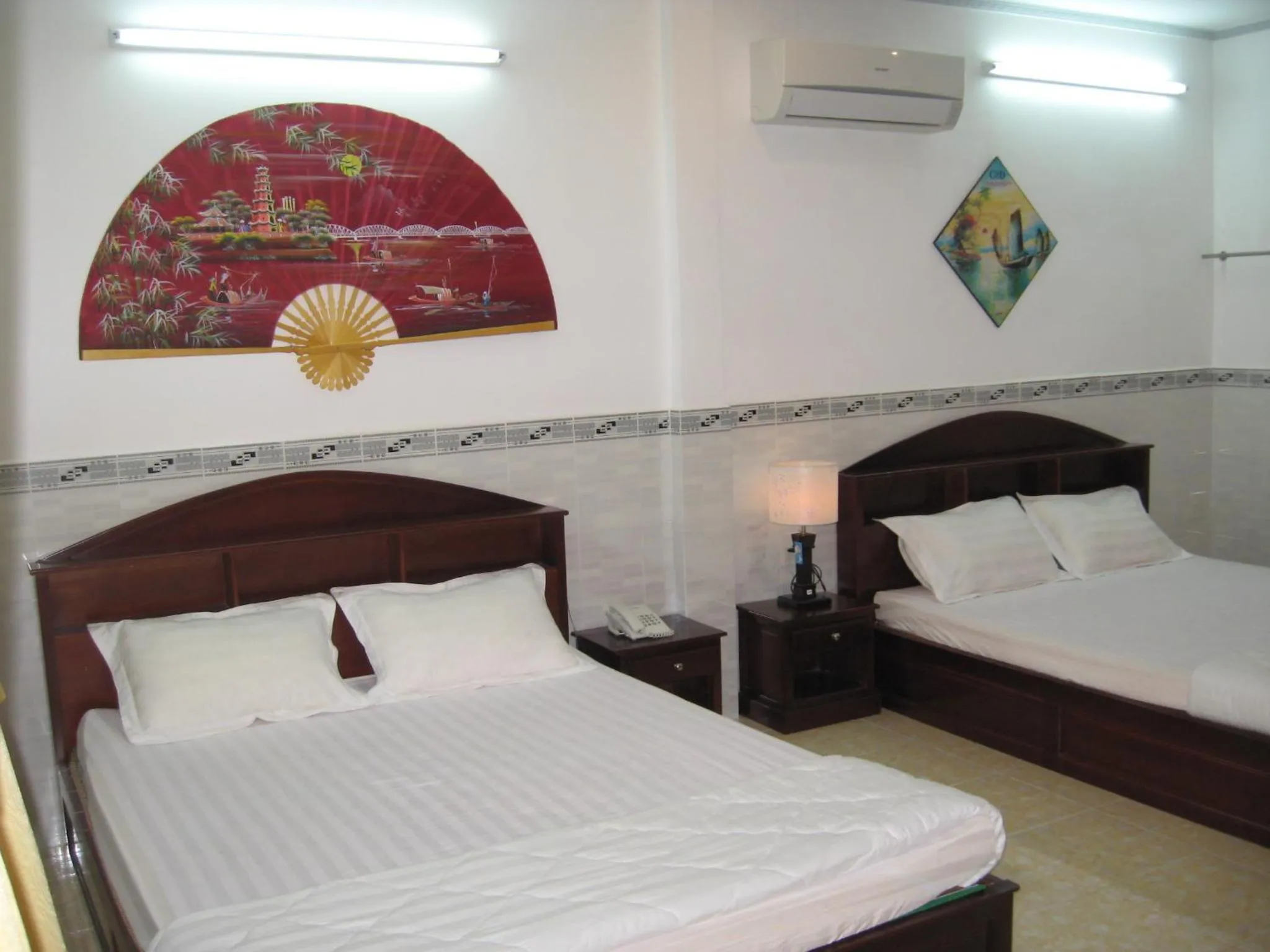 Photo of the whole room, Bed in Huynh Lac Can Tho Hotel