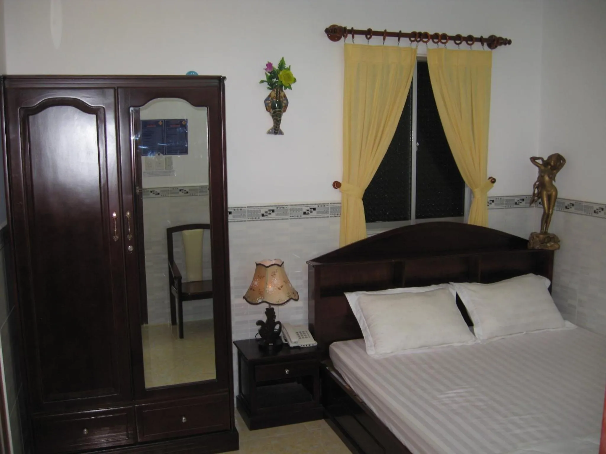 Bed in Huynh Lac Can Tho Hotel