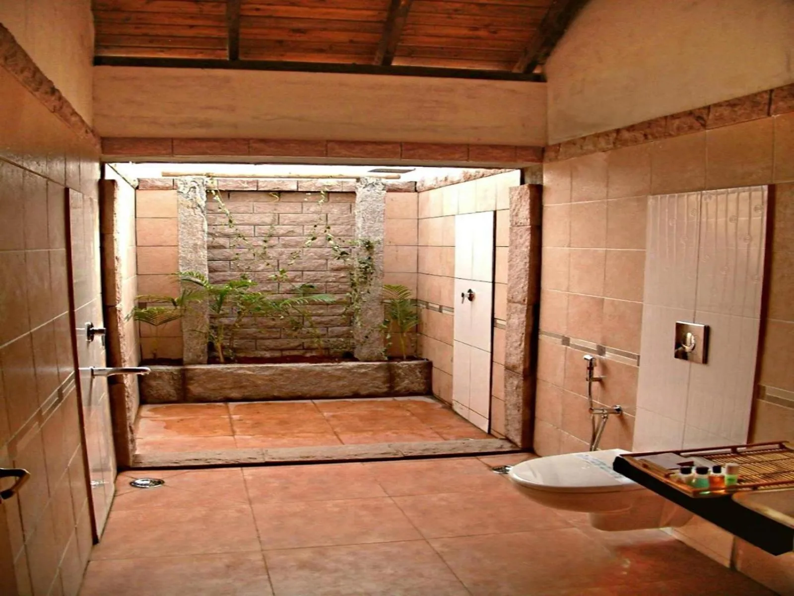 Bathroom in Kadambavanam Ethnic Village Resort