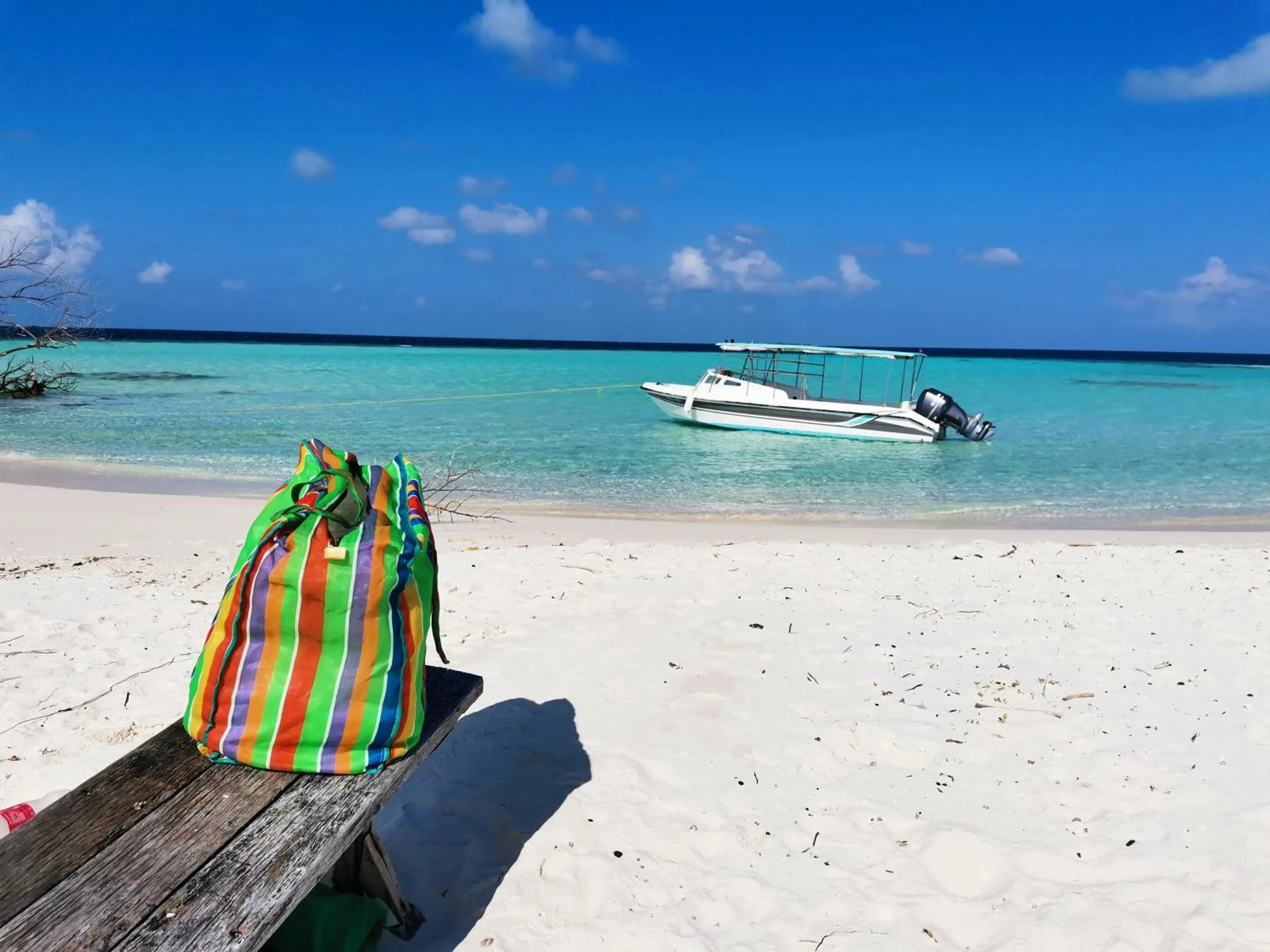 By the shade Maldives