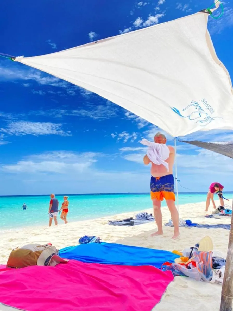 By the shade Maldives