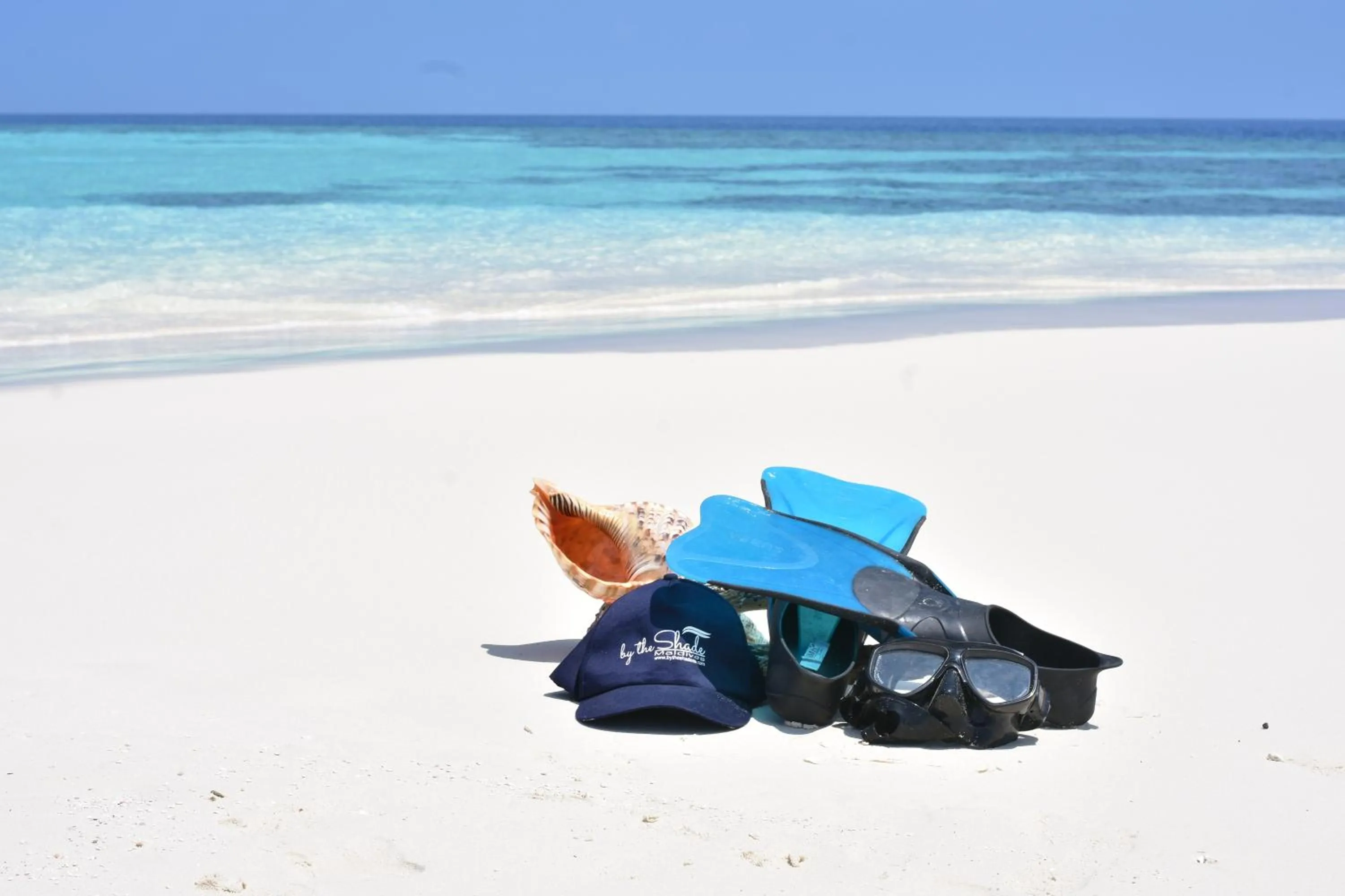 By the shade Maldives