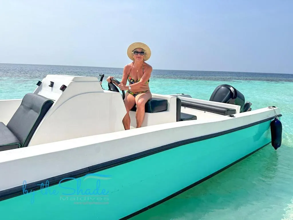 By the shade Maldives