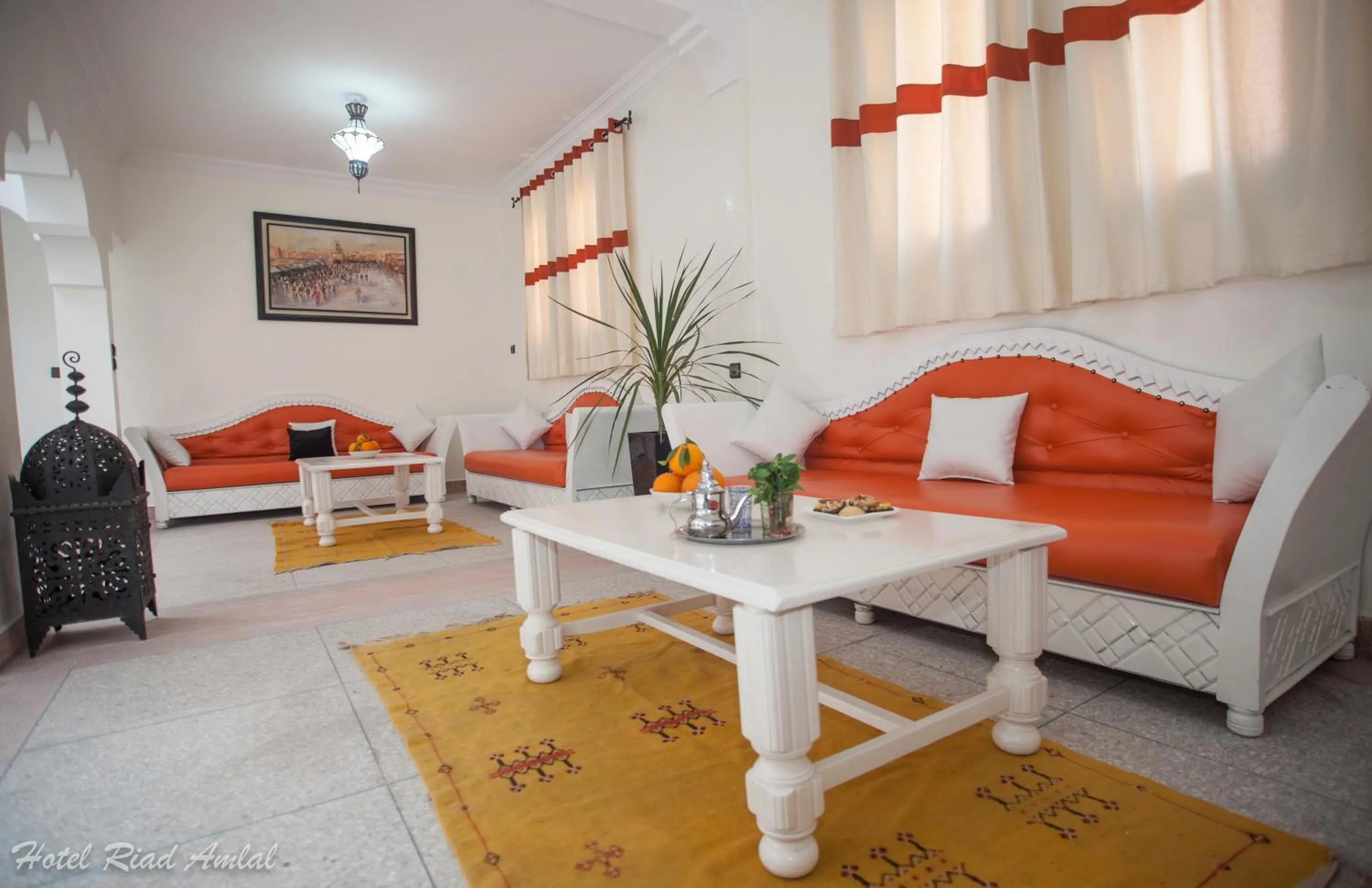 Communal lounge/ TV room in Hotel Riad Amlal