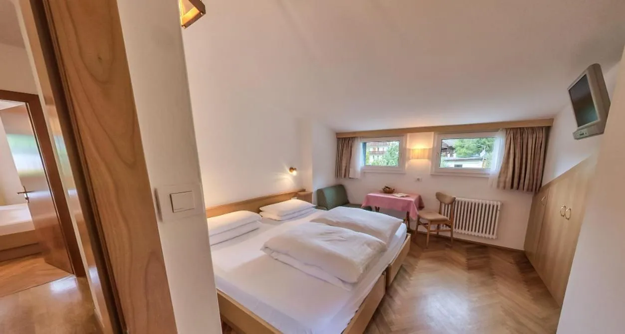 Bed in AppartChalet LA RONDULA - 100m from Seceda