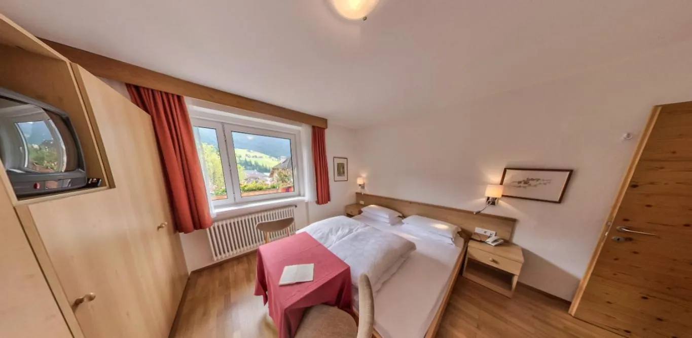 Bed in AppartChalet LA RONDULA - 100m from Seceda