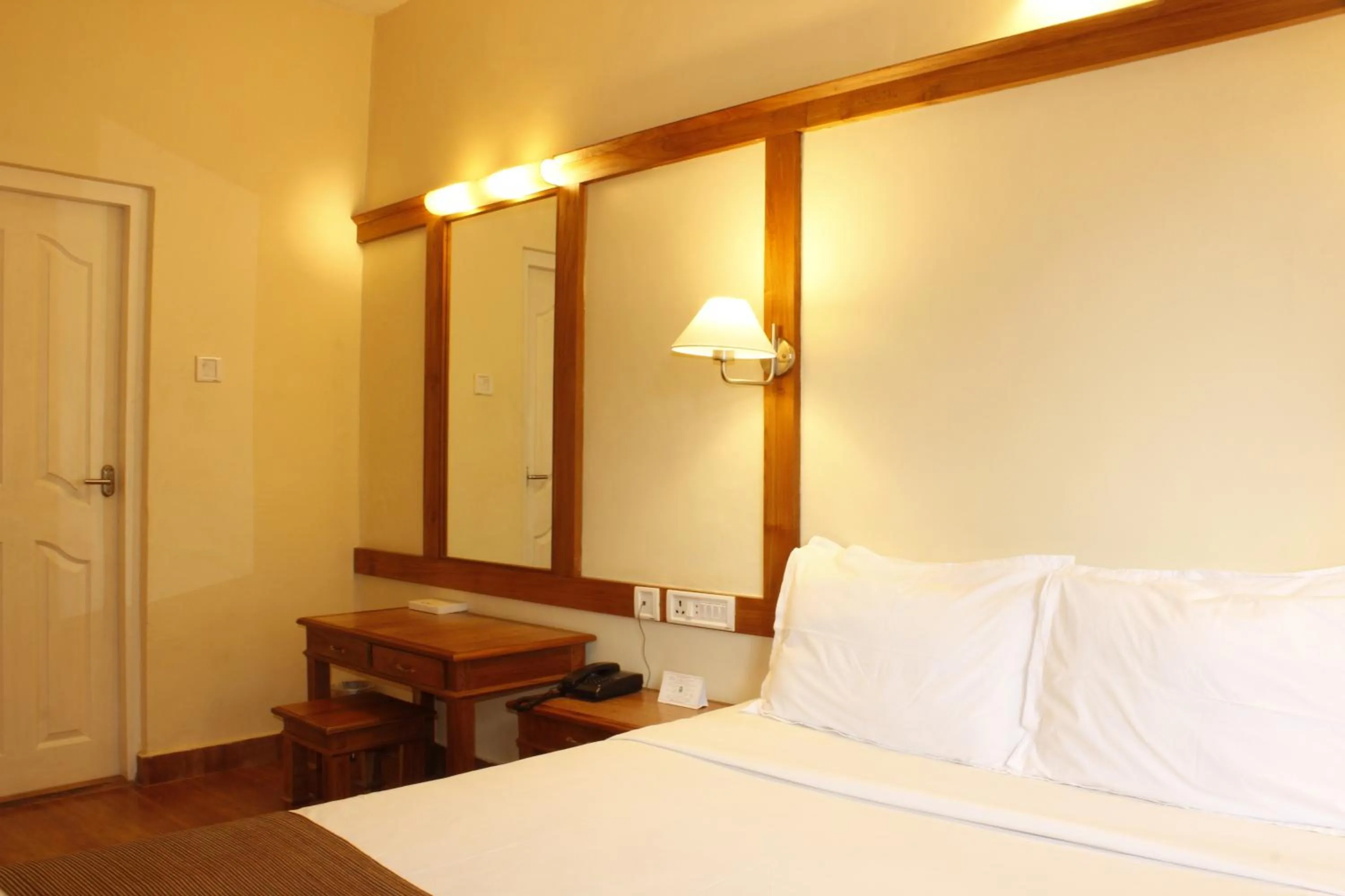 Bed in Kodai Resort Hotel, Kodaikanal