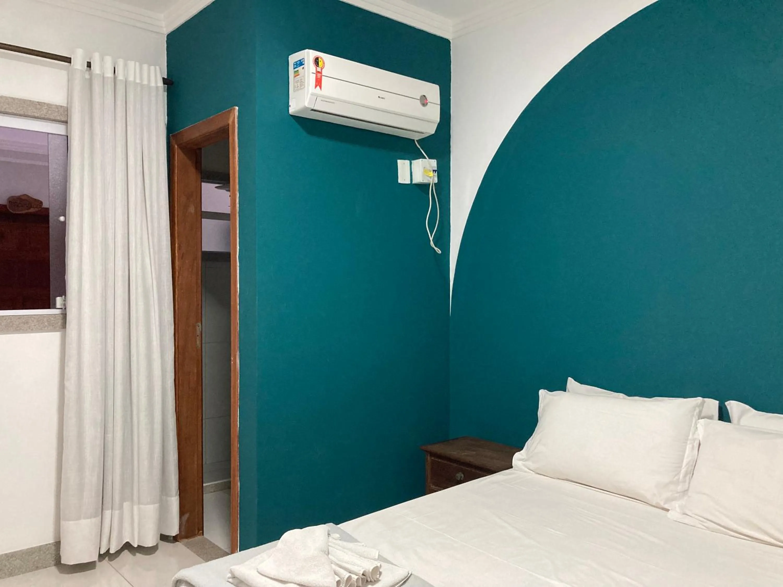 Bed in Pousada Pau Brasil Ubu