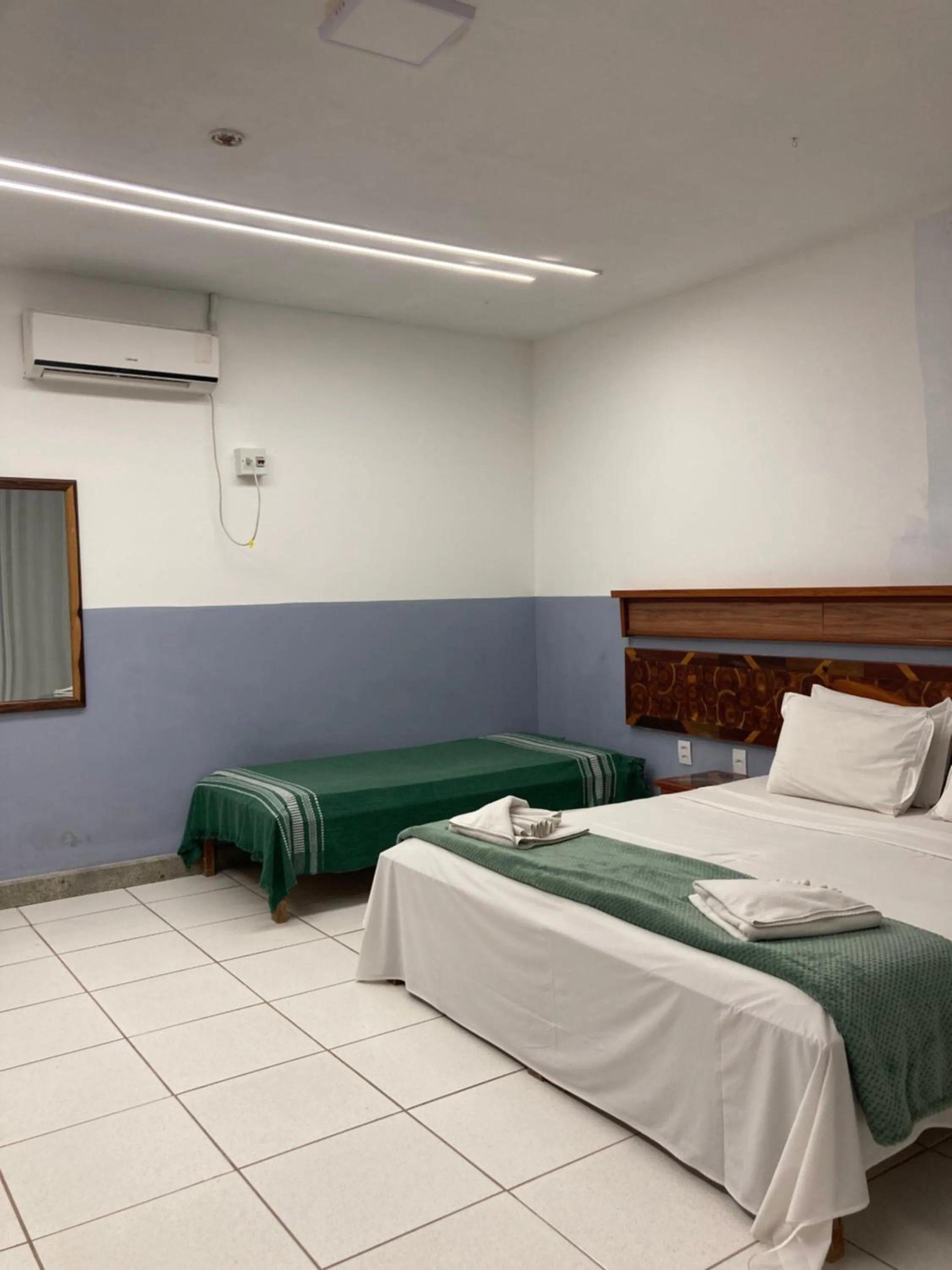 Bed in Pousada Pau Brasil Ubu