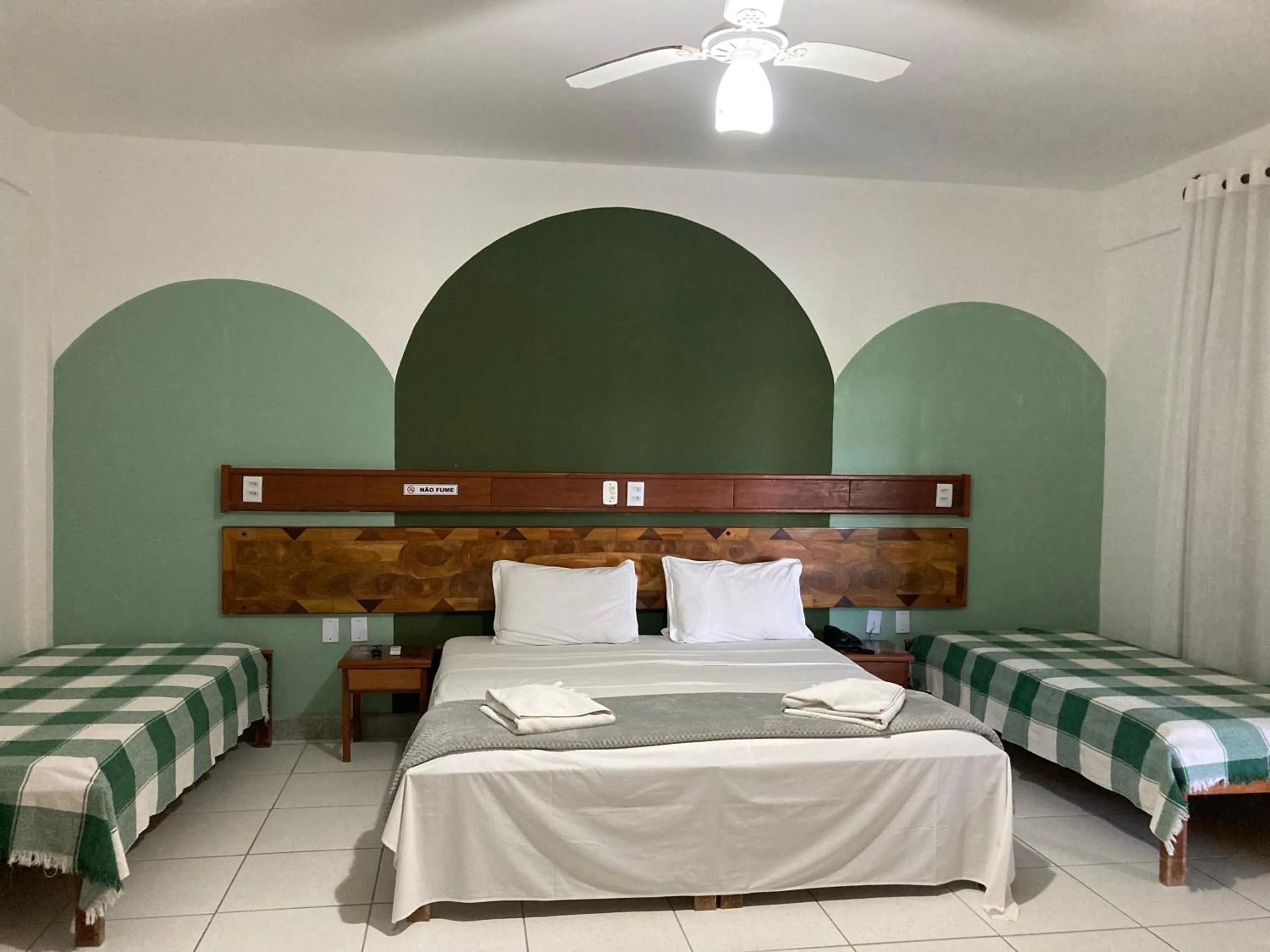 Bed in Pousada Pau Brasil Ubu