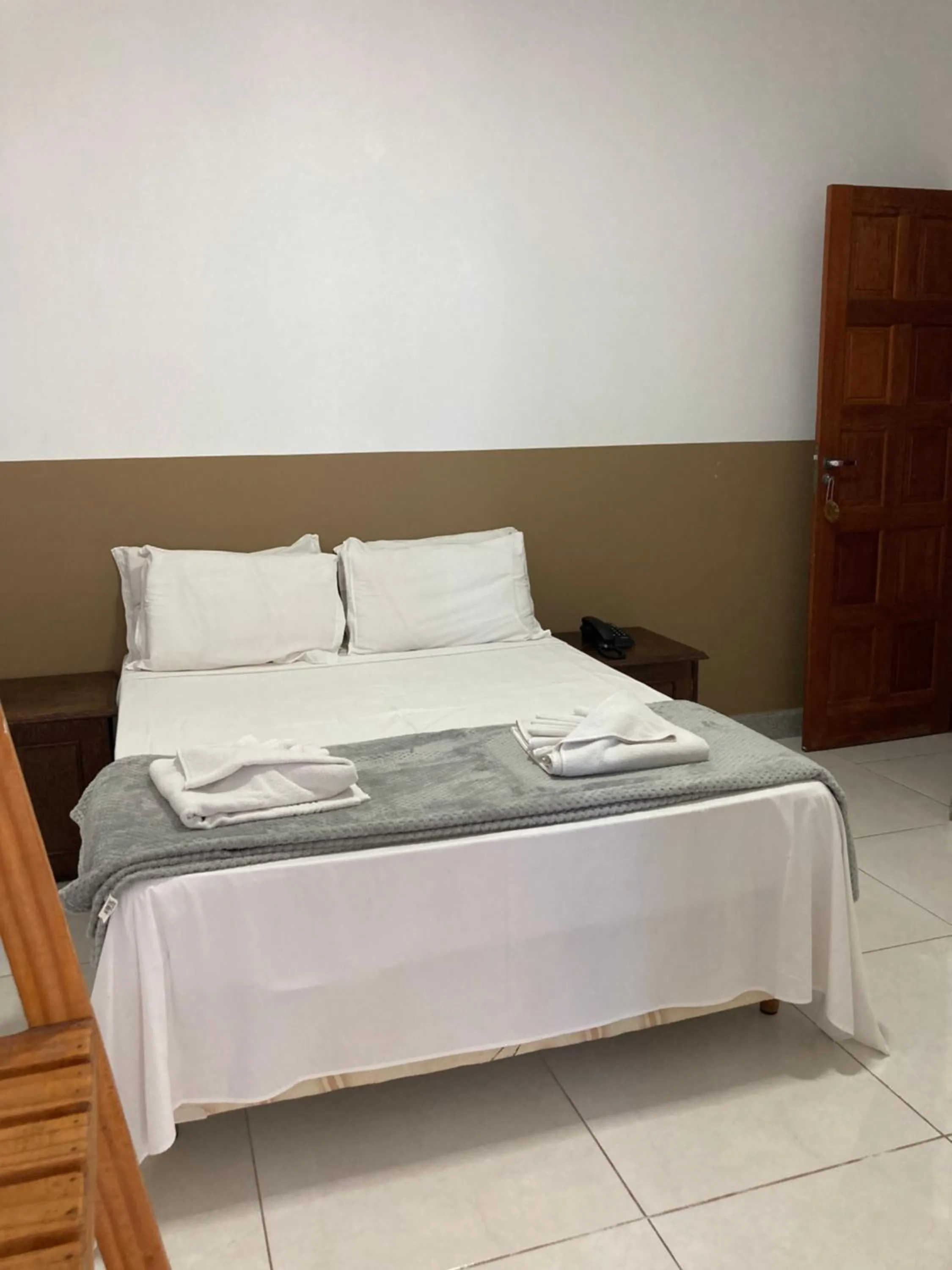 Bed in Pousada Pau Brasil Ubu