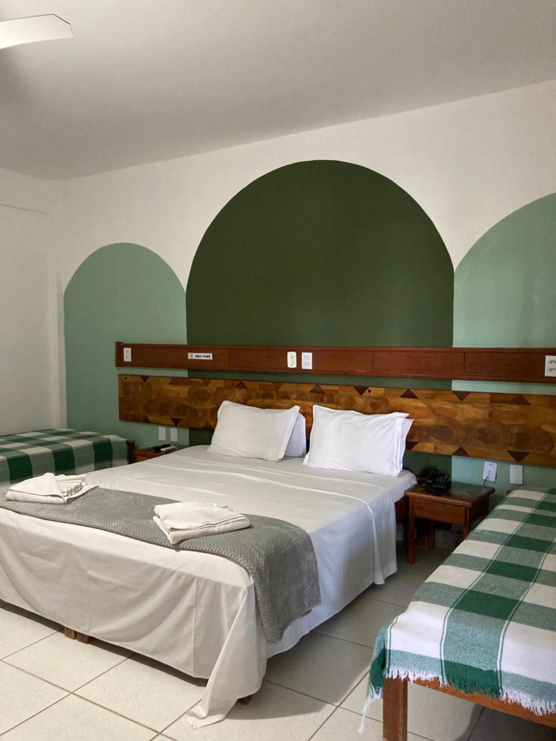 Bed in Pousada Pau Brasil Ubu