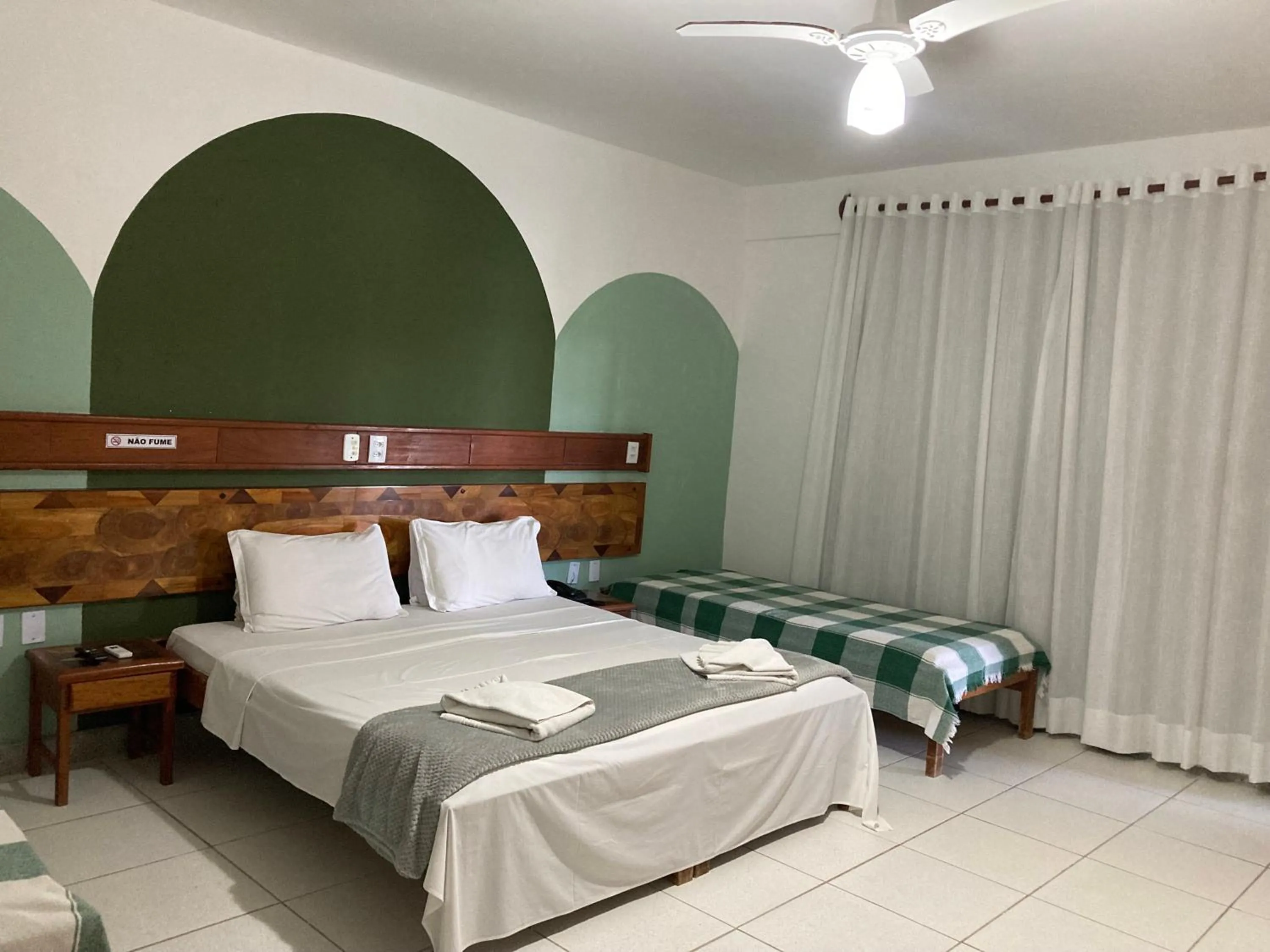 Bed in Pousada Pau Brasil Ubu