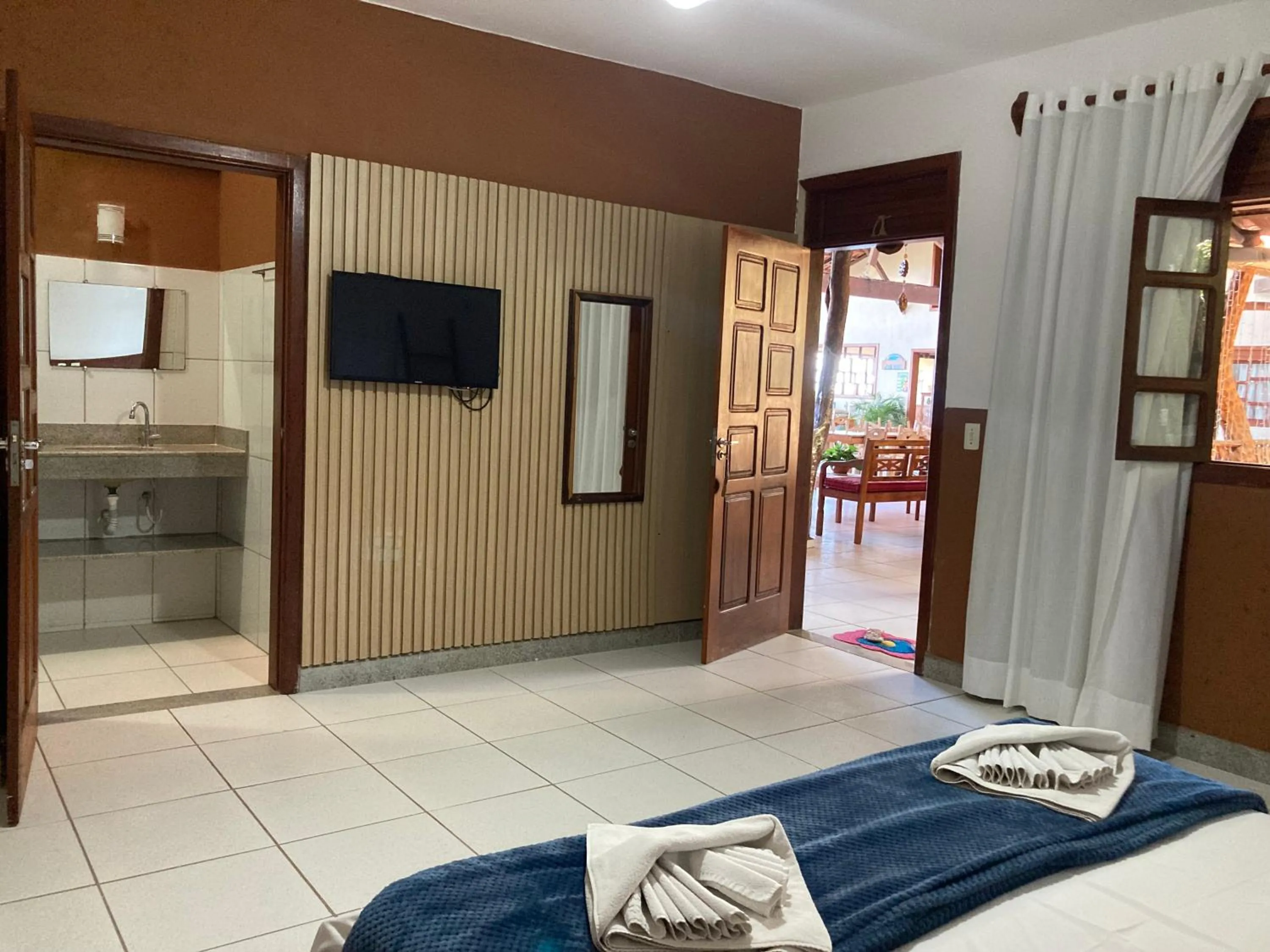 Bed in Pousada Pau Brasil Ubu