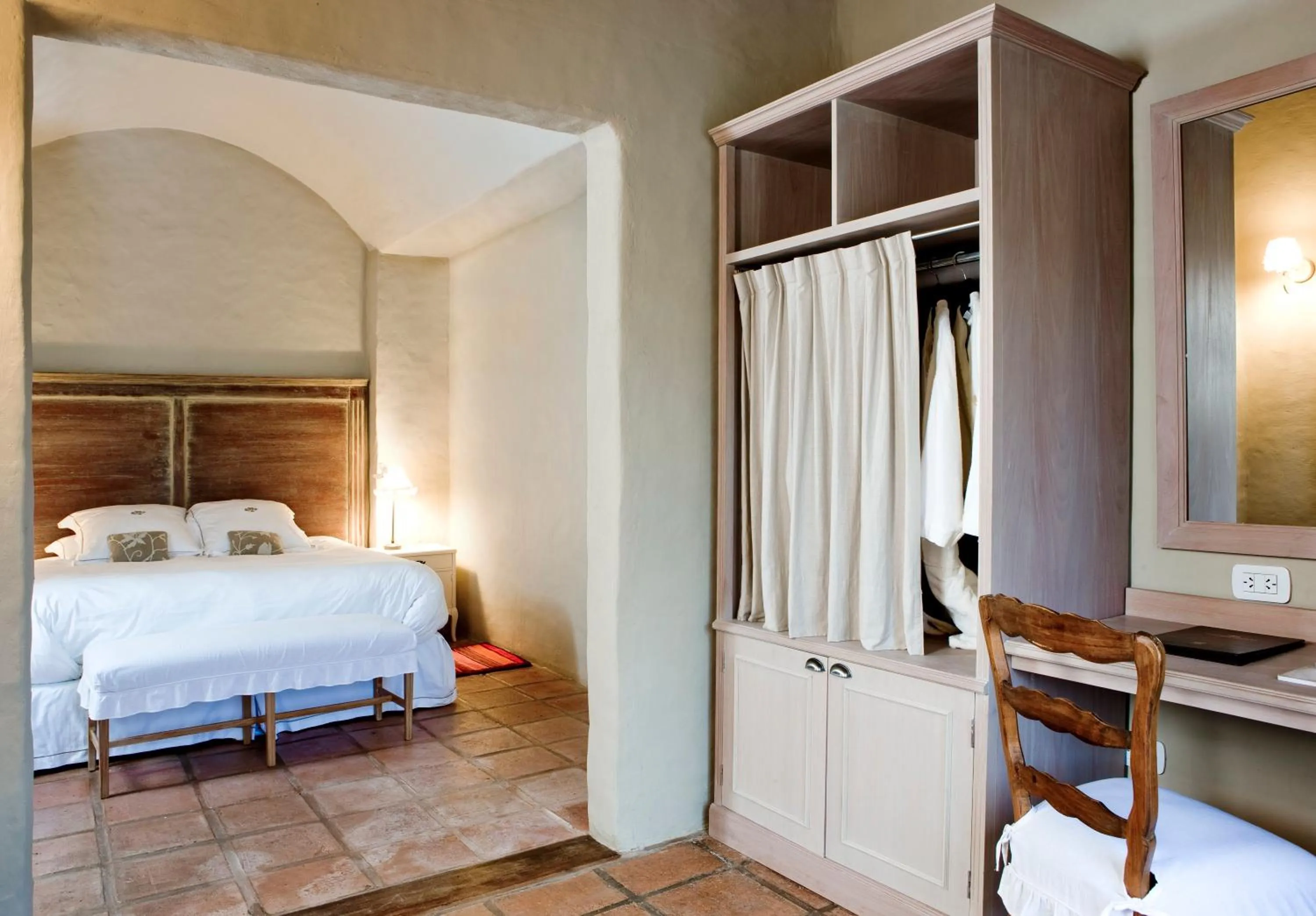 Bed in House of Jasmines Relais & Châteaux