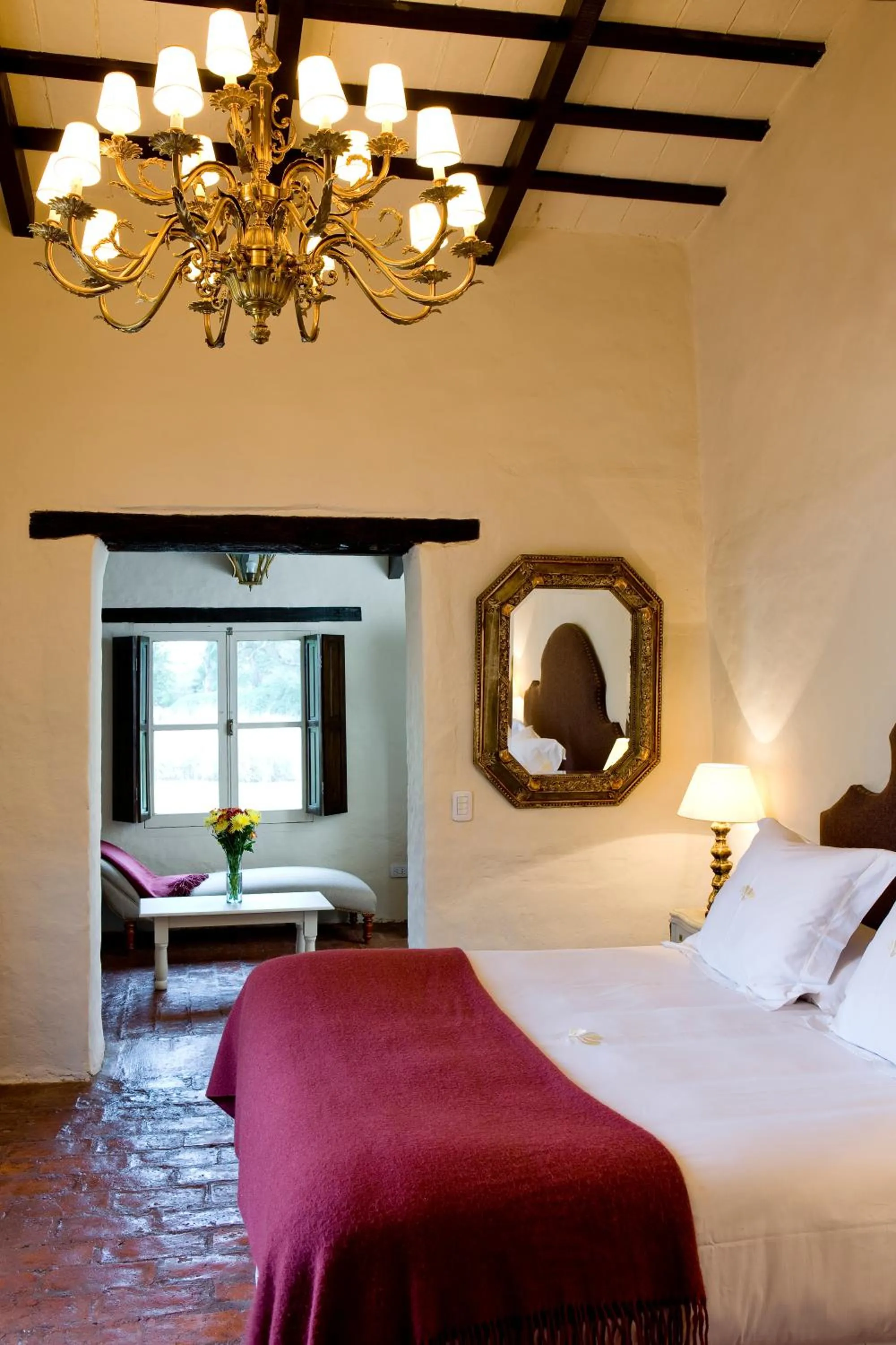 Bed in House of Jasmines Relais & Châteaux