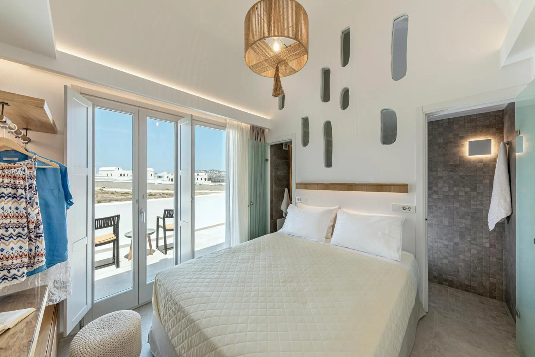 Bed in Alafropetra Luxury Suites