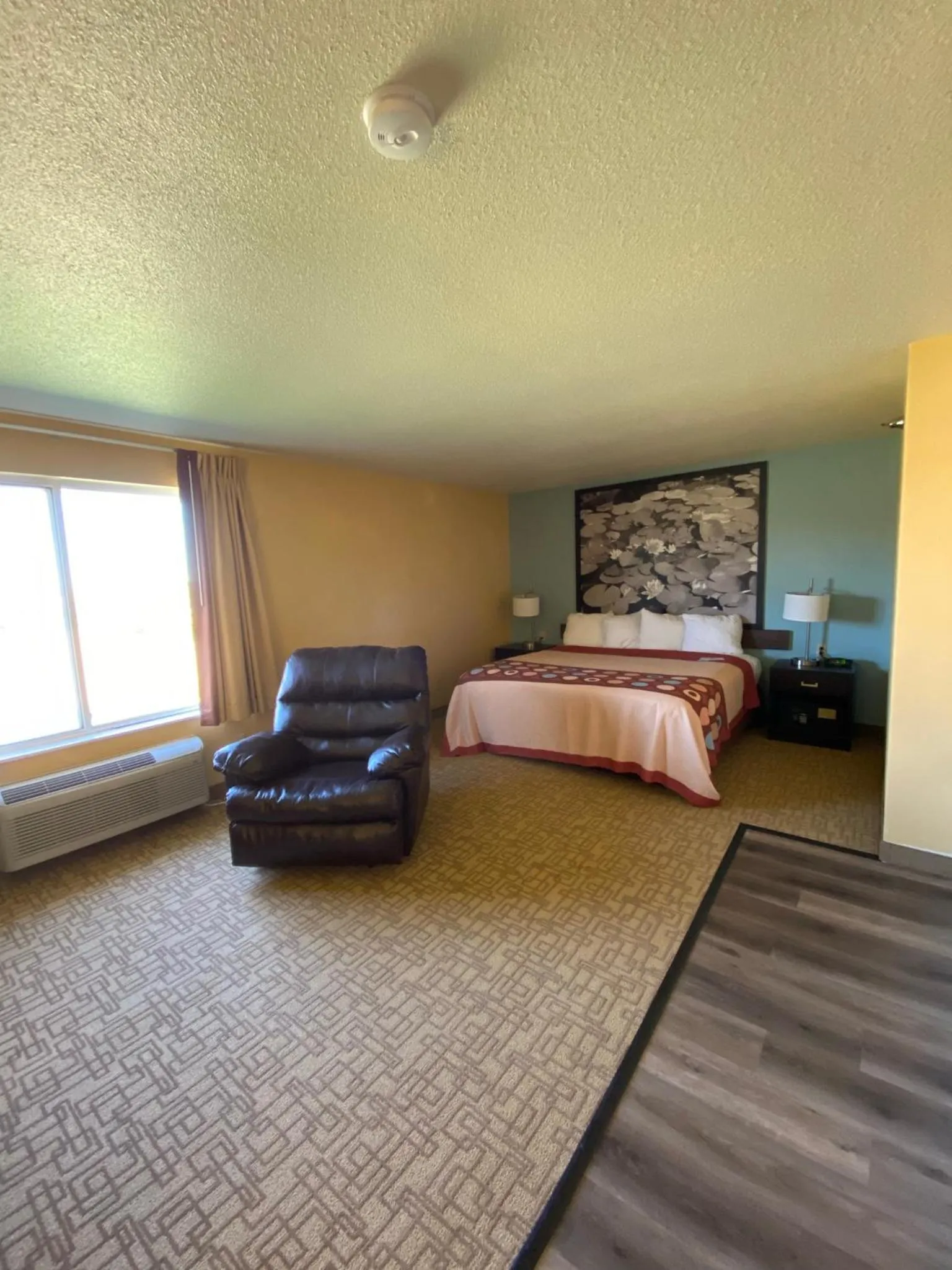 Bed in Super 8 by Wyndham Jackson MN