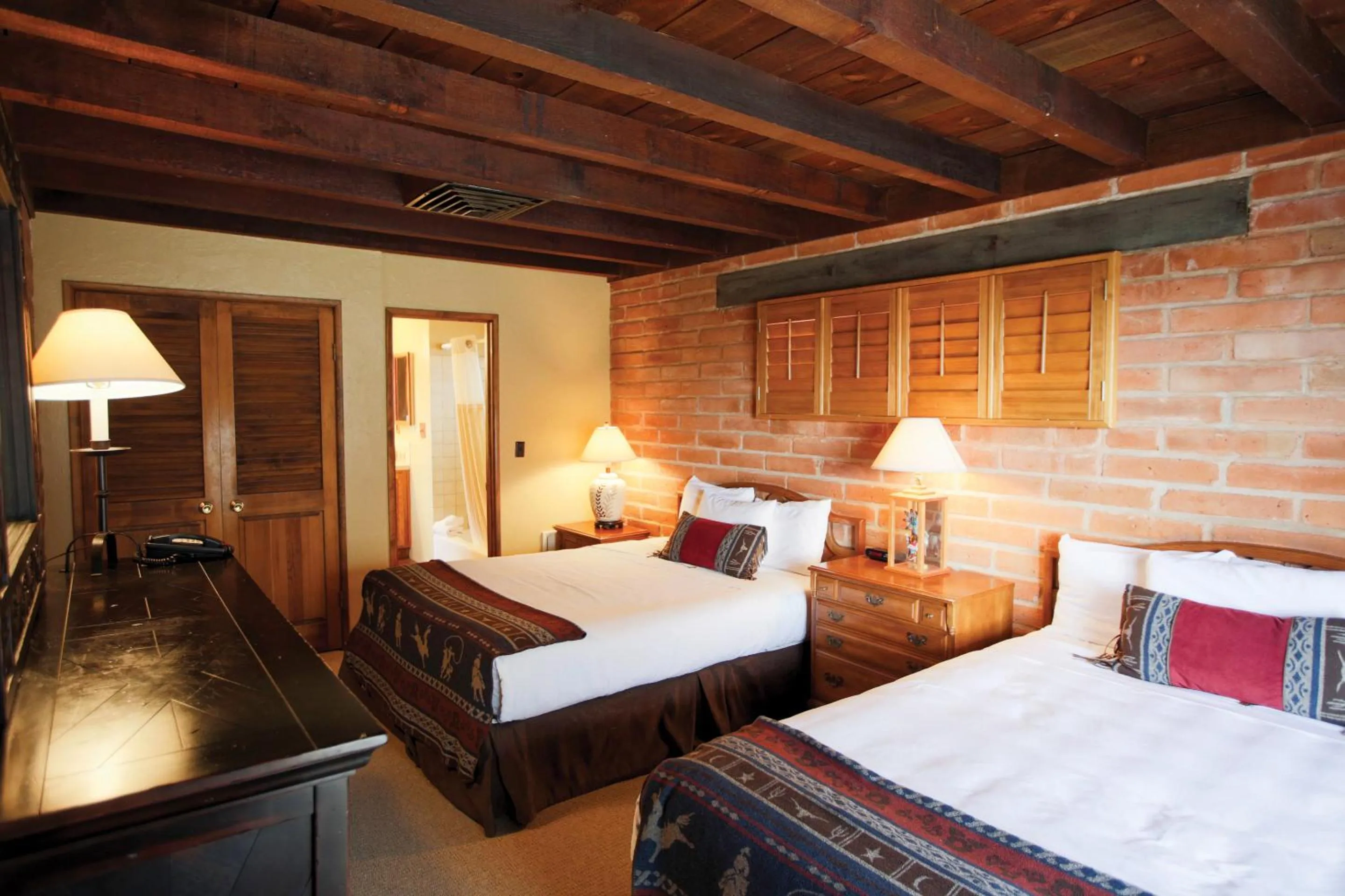 Bed in Tanque Verde Guest Ranch