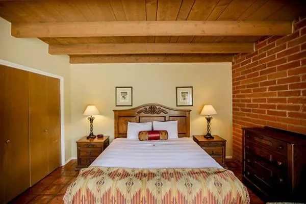 Bed in Tanque Verde Guest Ranch