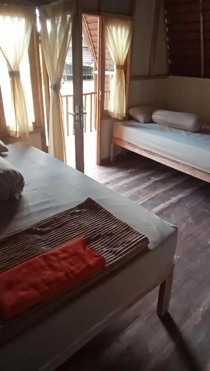 Bed in Tanjung Kalemo Resort