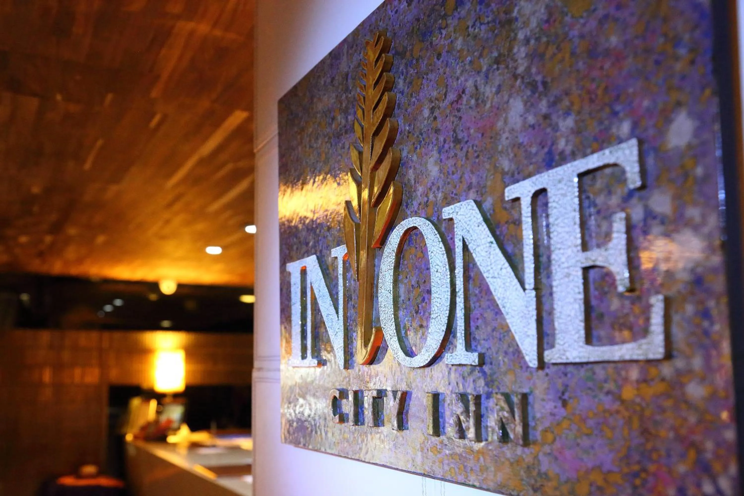 Property logo or sign in In One City Inn