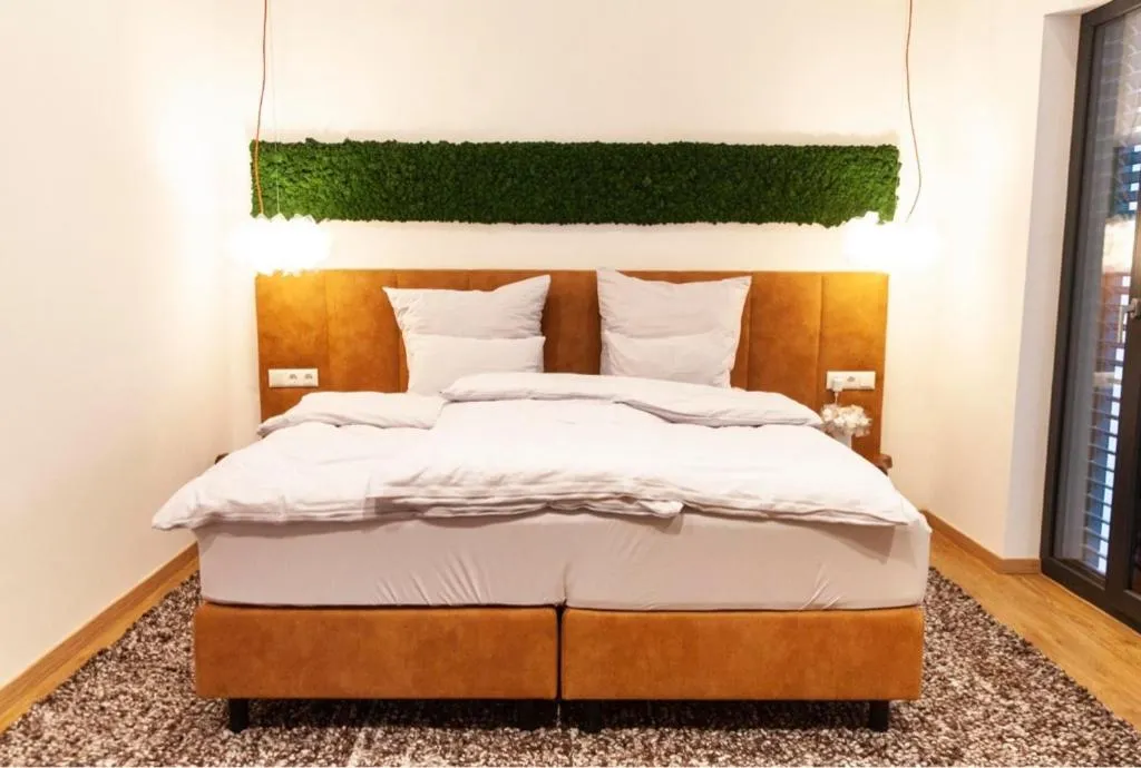 Bed in IchZeit Aparthotel