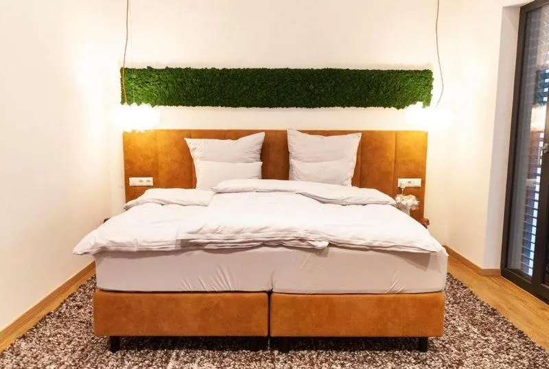 Bed in IchZeit Aparthotel