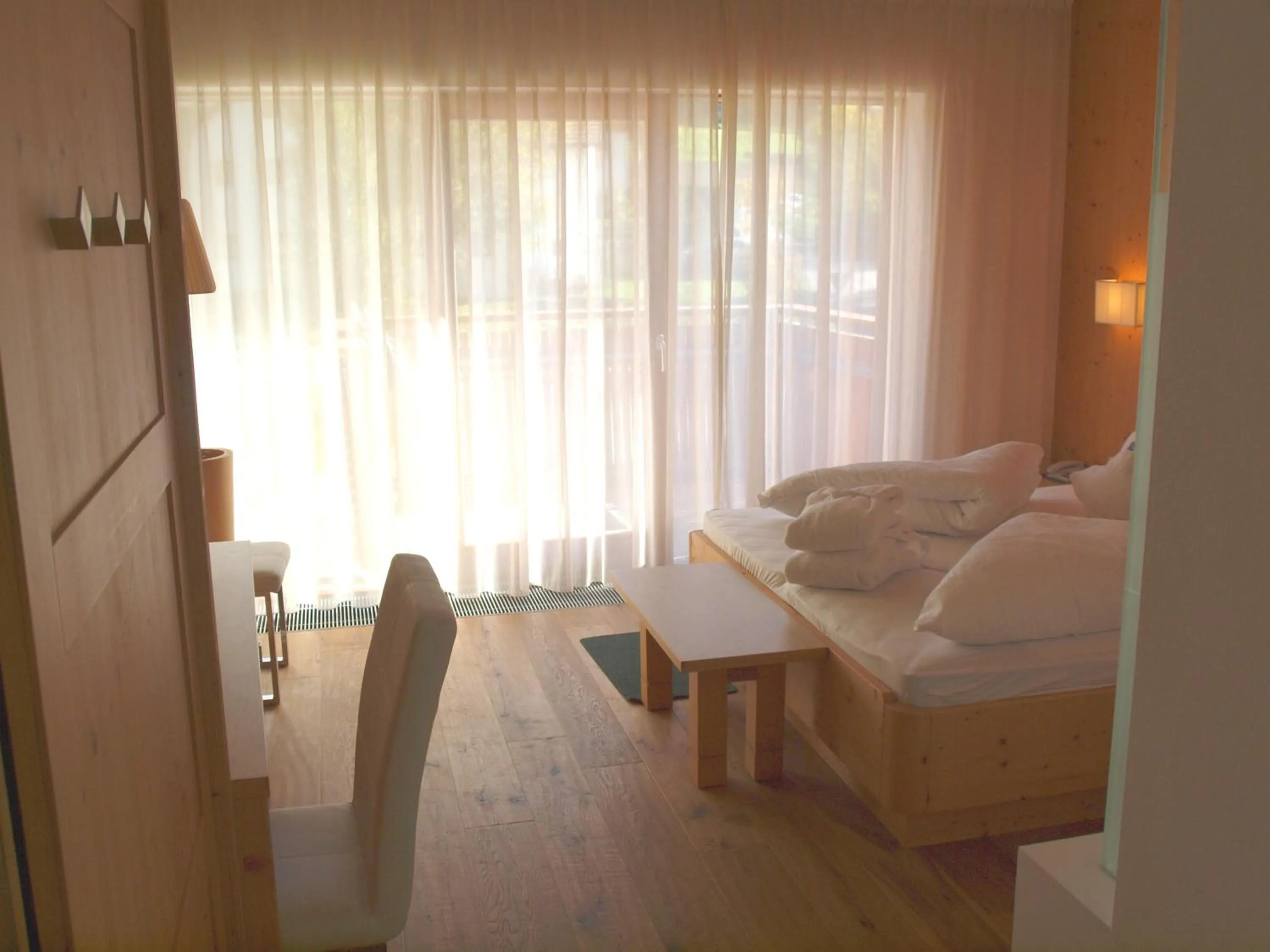 Living room, Bed in Sporthotel Rasen