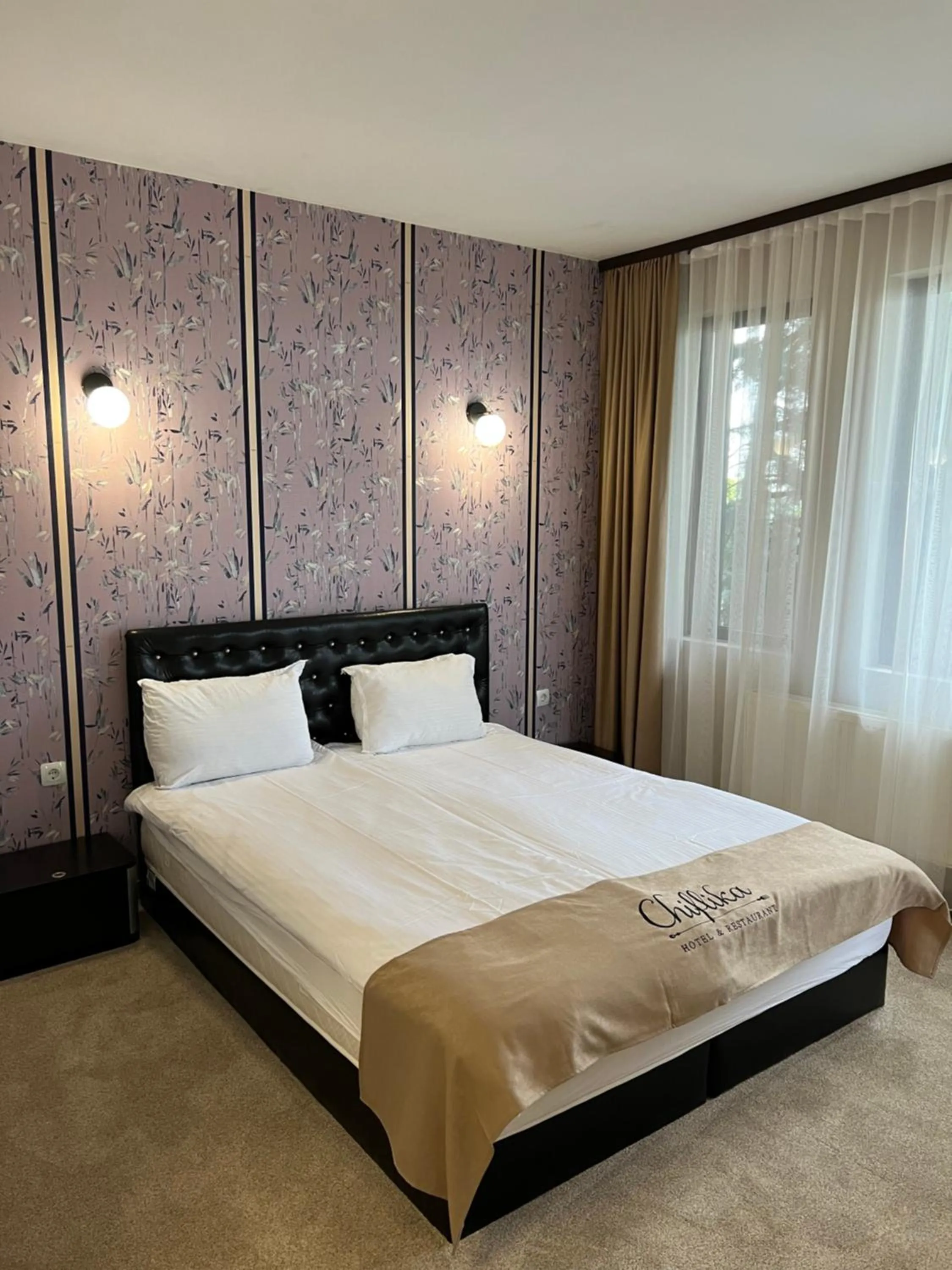 Bed in Chiflika Family Hotel