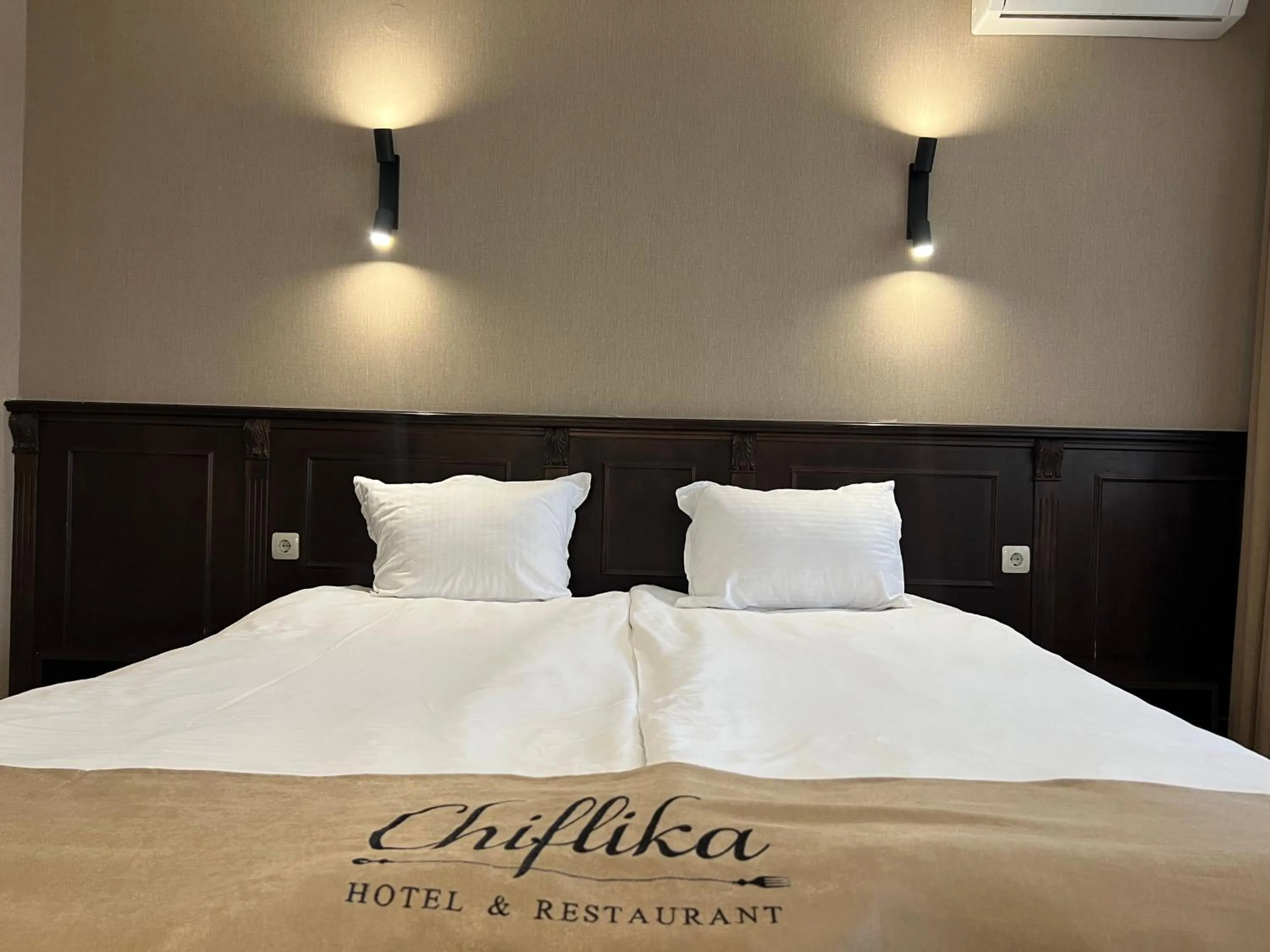 Bed in Chiflika Family Hotel