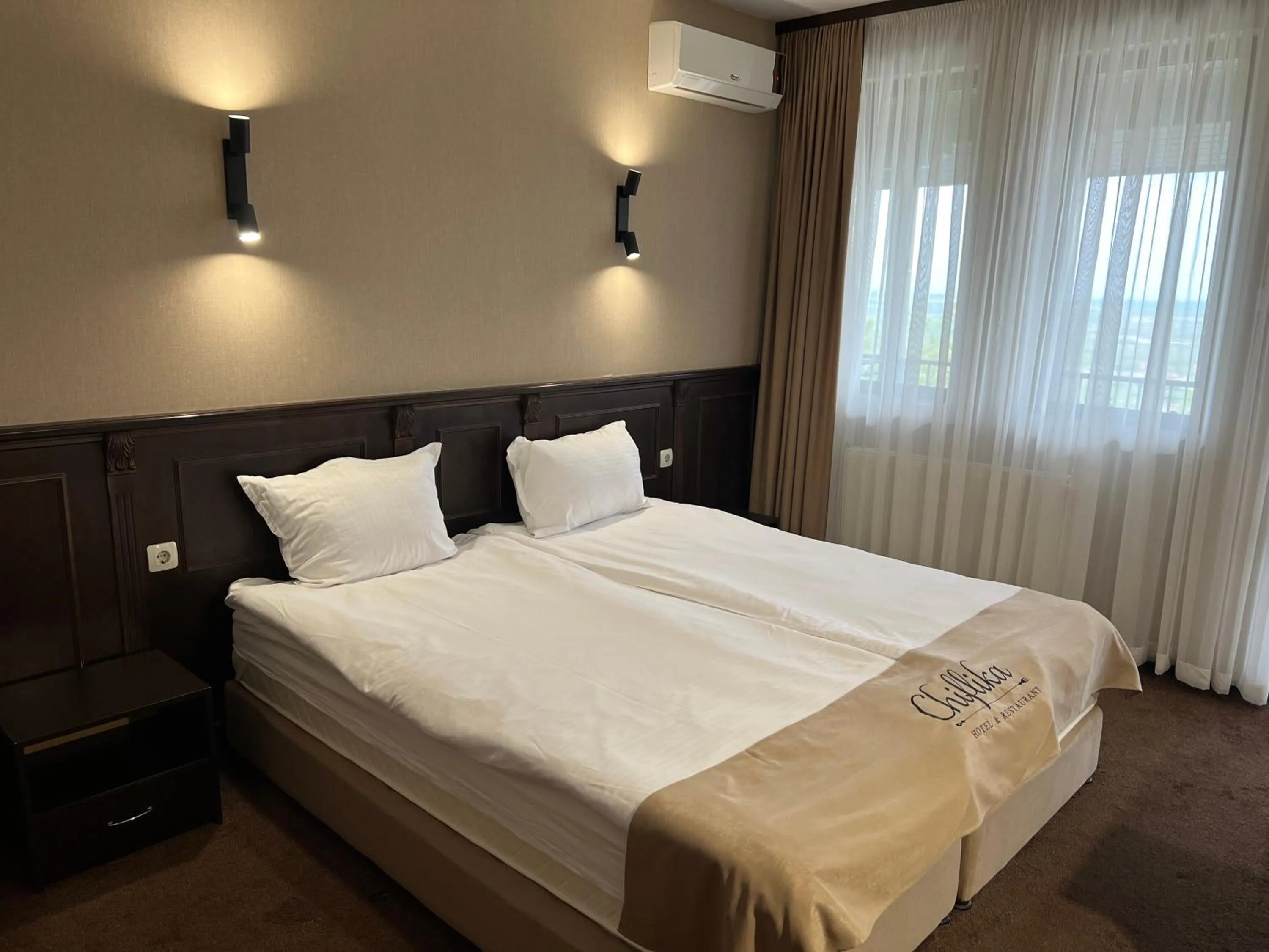 Bed in Chiflika Family Hotel